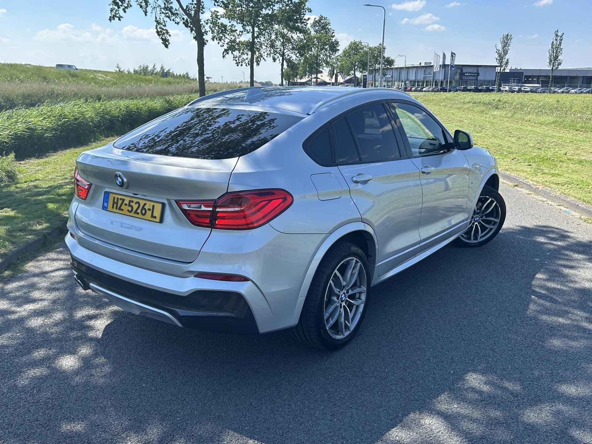 BMW X4 xDrive30d High Executive | M-Sport | Navigatie | Volledig Lederen Bekleding | Sportstoelen | ClimateControl | PDC | Xenon | - 11/35