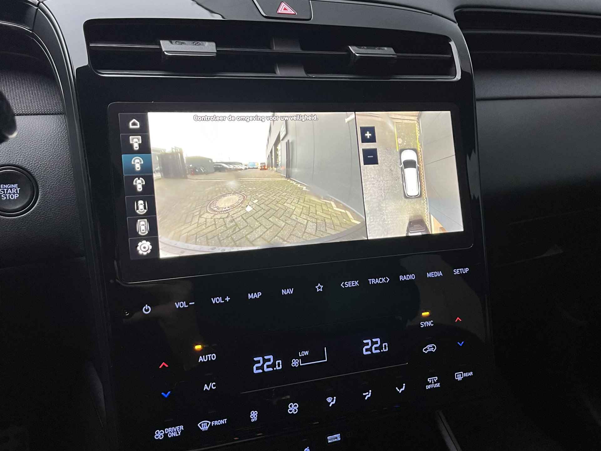 Hyundai Tucson 1.6 T-GDI HEV 230pk N-Line Automaat | Carplay | Climate | Keyless | Trekhaak | Navigatie | Elek. Klep | LED verlichting | 360 Ca - 31/40