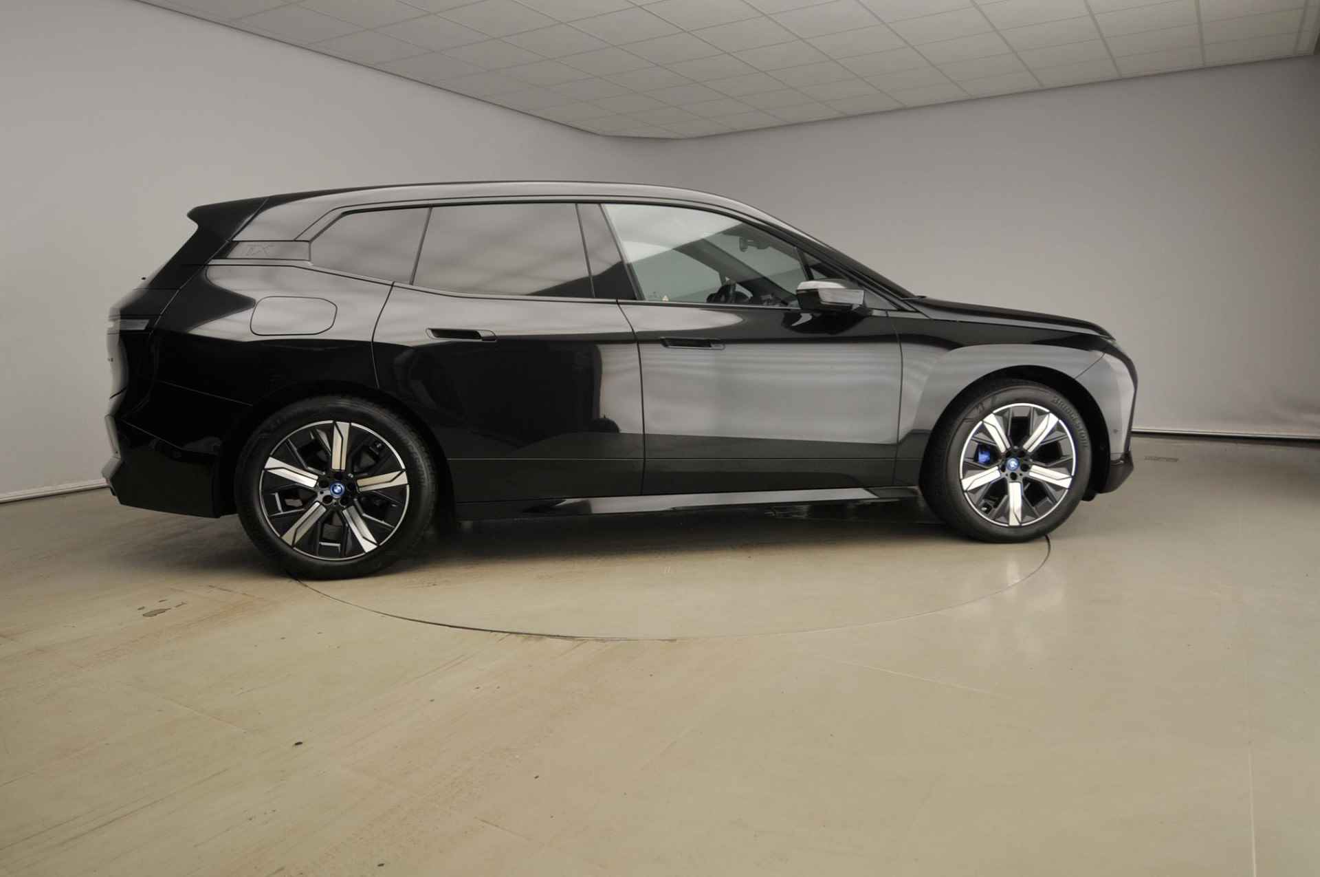 BMW iX xDrive40 | Sportpakket | Laserlicht | Leder | HUD | Trekhaak | Keyles go | DAB | Harman-kardon sound | Alu 21 inch - 5/50