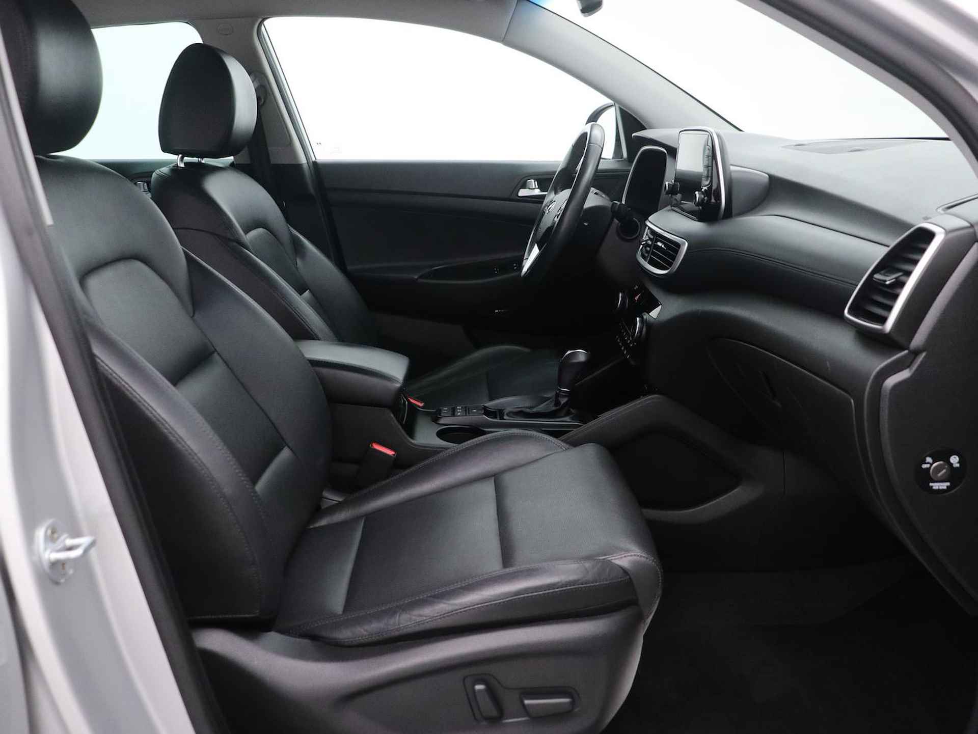 Hyundai Tucson 1.6 T-GDI Comfort Automaat | Rijklaarprijs! | Navigatie | Lederen stoelen elekt. verstelbaar | Achteruitrijcamera | Stoelverwarming | Inclusief 36 maanden garantie | - 13/39