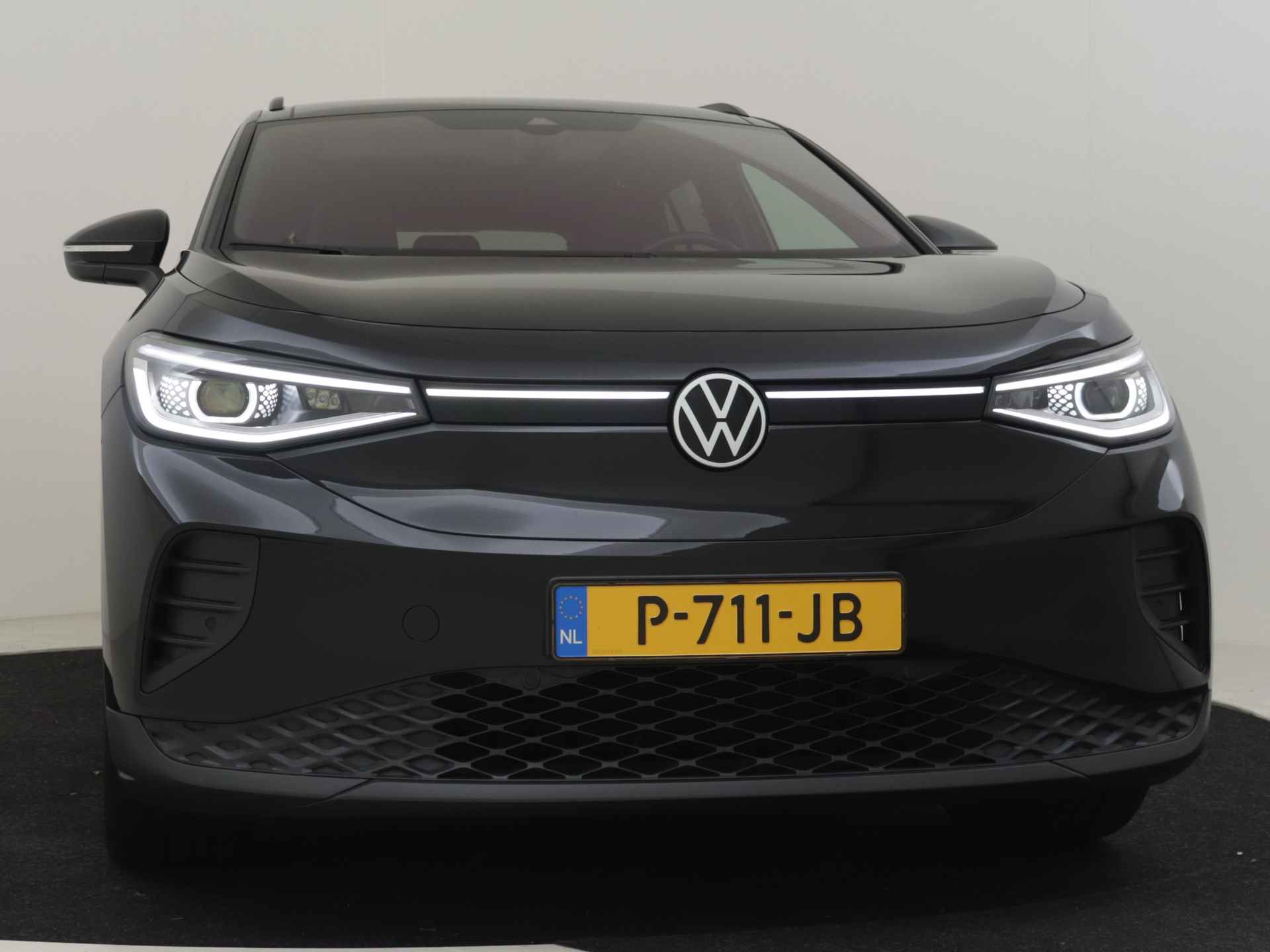 Volkswagen ID.4 Pro 204pk 77 kWh | 100% Dealeronderhouden | 1ste Eigenaar | Zwenkbare trekhaak | Panorama dak | Cruise control adaptief | Achter - 22/34