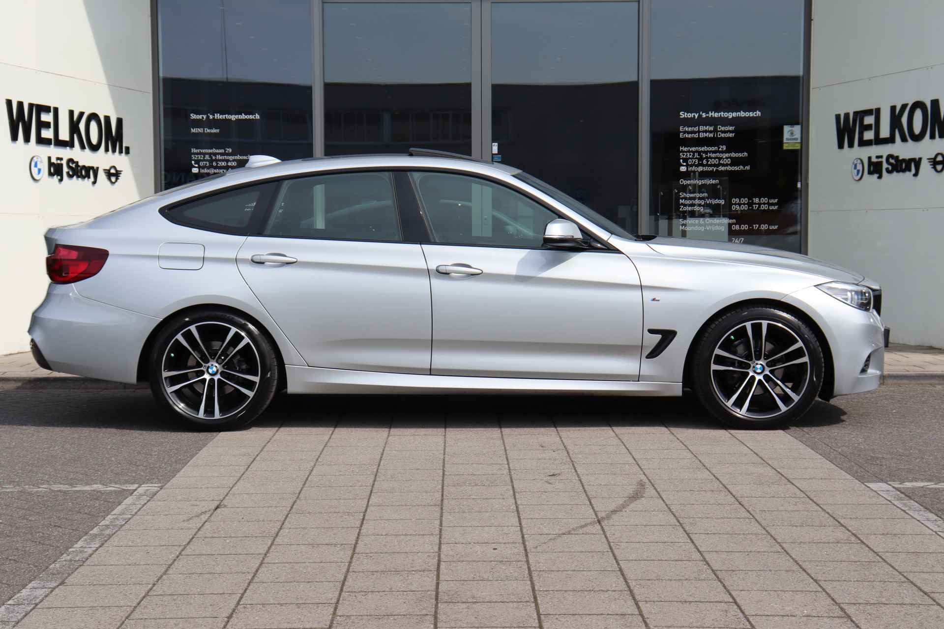 BMW 3-serie Gran Turismo 320i High Executive M Sport Automaat / Panoramadak / Sportstoelen / LED / M Sportonderstel / Navigatie Professional / Stoelverwarming - 7/33