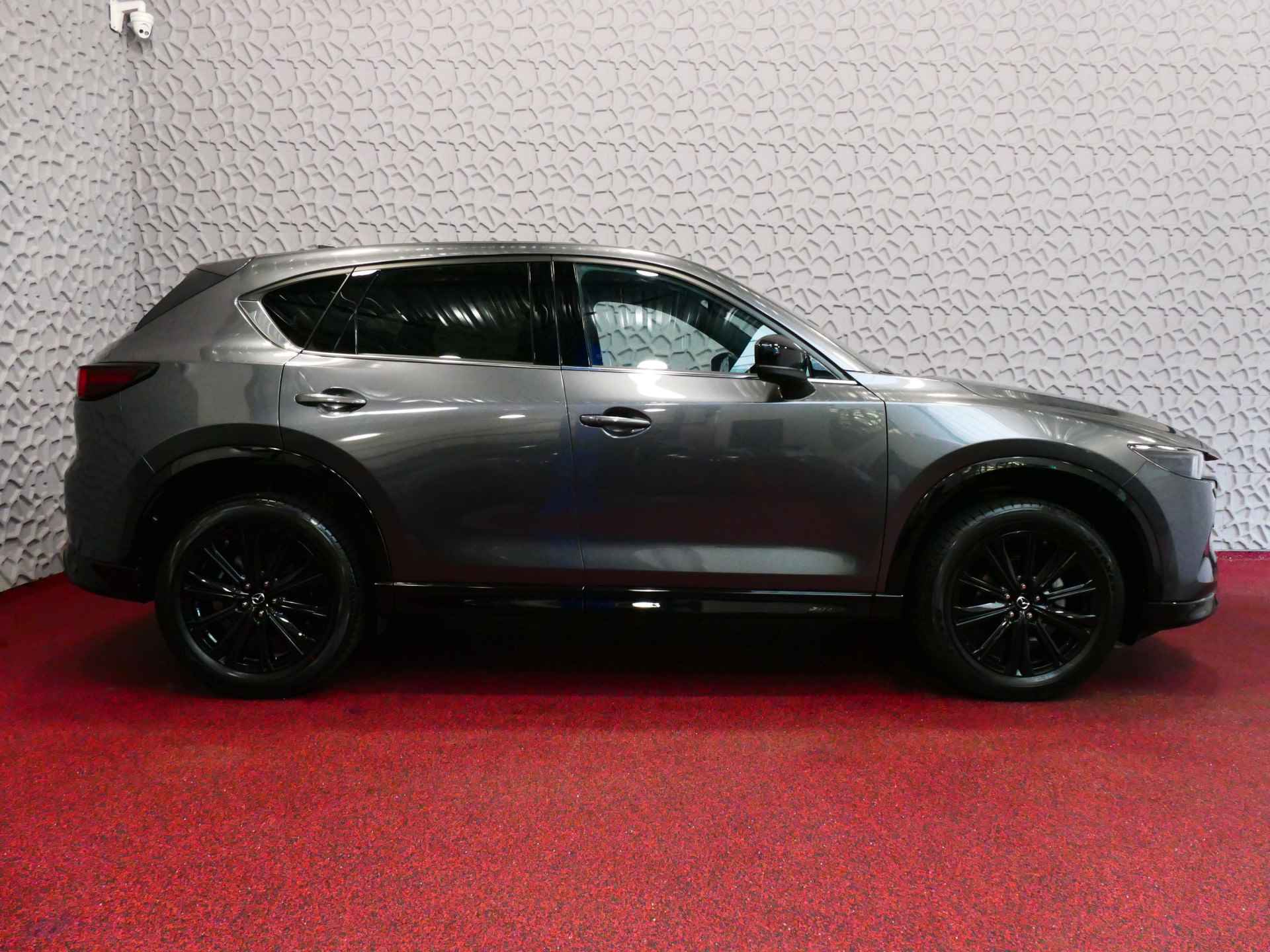 Mazda CX-5 E-SKYACTIV MHEV 2.0 165 PK HOMURA LEER BOSE ELEK.KLEP HEADUP 360.CAMERA 19''LMV FULL LED CARPLAY NAVI STOEL/STUUR VERW. STOELKOE 06/2024 - 47/64