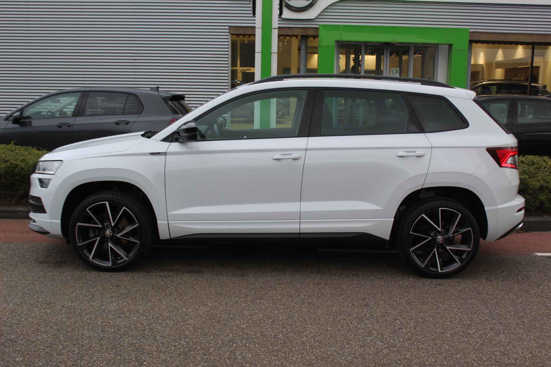 Škoda Karoq 1.5 TSI ACT 150pk DSG Sportline / 19"LMV / APP.Connect / CAMERA / PANODAK / Full LED / Stoelverwarming V+A - 5/38