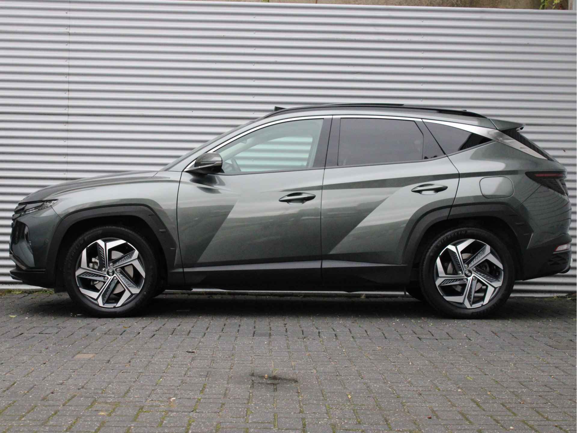 Hyundai Tucson 1.6 T-GDI HEV Premium Sky 230pk | Schuif-/Kanteldak | Trekhaak | Vol-Leder | Elektr. Stoelen | Stoelkoeling/Verwarming | Elektr. - 3/38