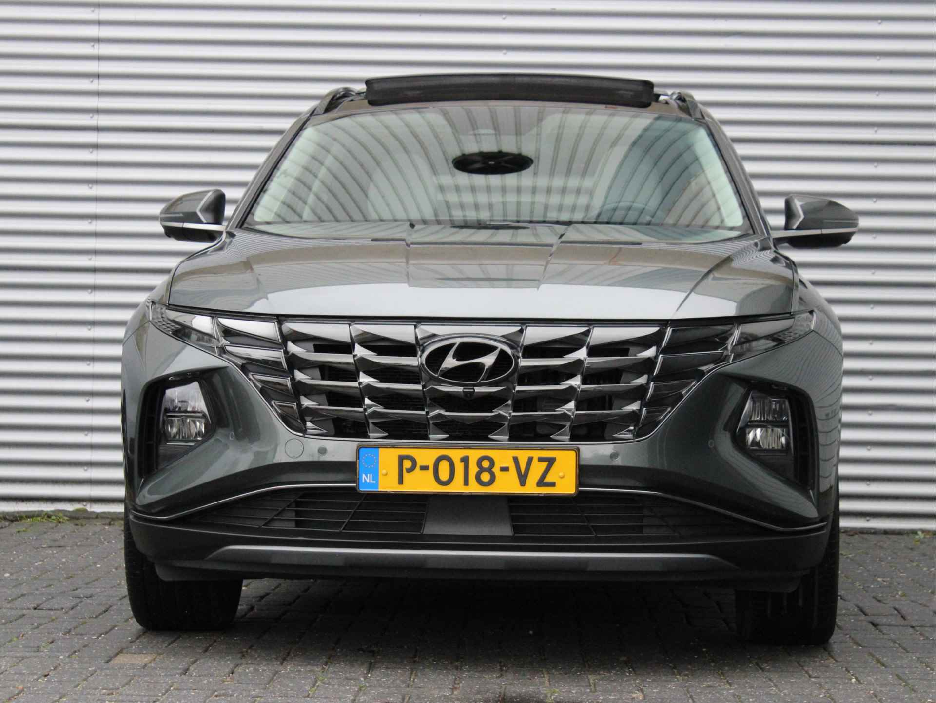 Hyundai Tucson 1.6 T-GDI HEV Premium Sky 230pk | Schuif-/Kanteldak | Trekhaak | Vol-Leder | Elektr. Stoelen | Stoelkoeling/Verwarming | Elektr. - 4/38