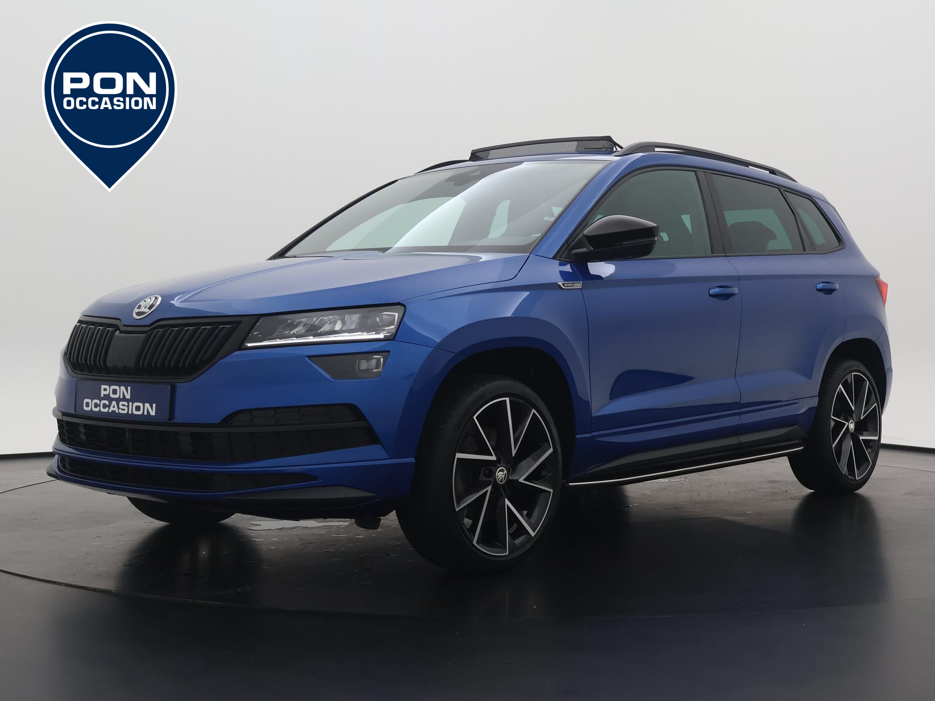 Skoda Karoq 1.5 TSI ACT Sportline Business | Pano dak | Navigatie | ACC | Stoelverwarming | Parkeersensoren | 19"|