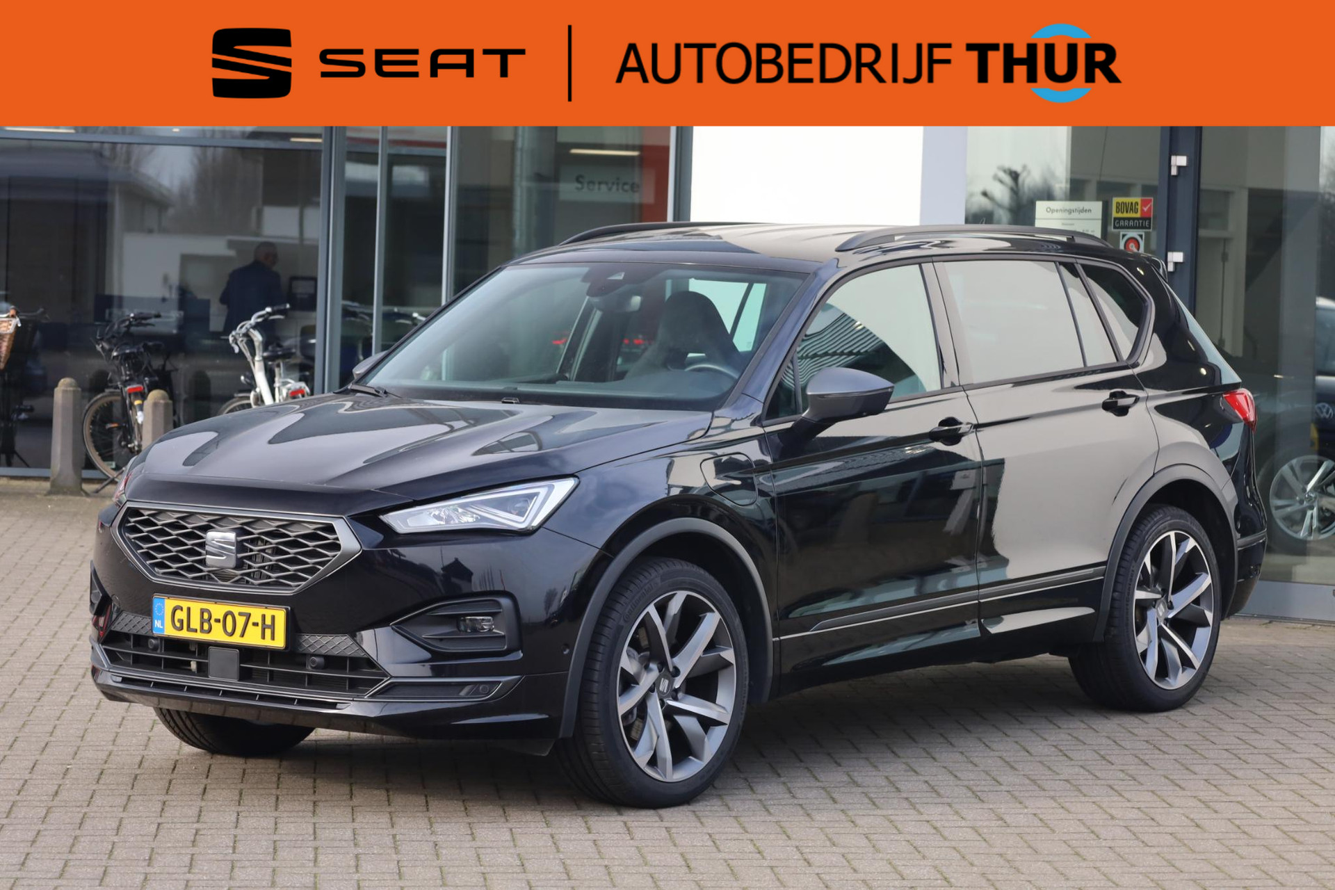 SEAT Tarraco 1.4 TSI e-Hybrid PHEV FR 245PK / 180kW DSG, Achteruitrijcamera, parkeersensoren voor en achter (pdc), verwarmbare voor- en achterstoelen, verwarmbaar stuurwiel, predictive adaptieve cruise control (acc) met Stop & Go + stuurhulp, full map navigatie, draadloos Apple Carplay / Android Auto, aanhanger manoeuvreer- en parkeerhulp, 20'' 'Supreme Cosmo Grey' LMV, keyless start & entry, DAB+, elektrisch verstelbare bestuurdersstoel met geheugen, elektrisch verstel-, verwarm en inklapbare spiegels, LED-verlichting