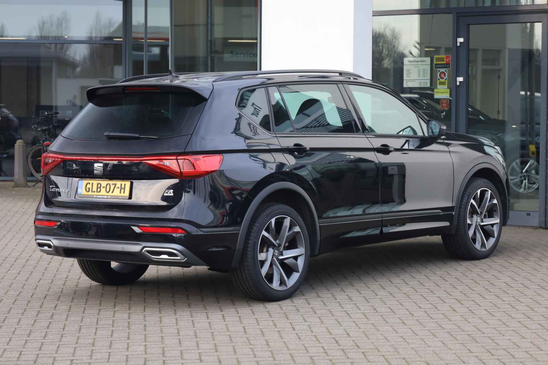 SEAT Tarraco 1.4 TSI e-Hybrid PHEV FR 245PK / 180kW DSG, Achteruitrijcamera, parkeersensoren voor en achter (pdc), verwarmbare voor- en achterstoelen, verwarmbaar stuurwiel, predictive adaptieve cruise control (acc) met Stop & Go + stuurhulp, full map navigatie, draadloos Apple Carplay / Android Auto, aanhanger manoeuvreer- en parkeerhulp, 20'' 'Supreme Cosmo Grey' LMV, keyless start & entry, DAB+, elektrisch verstelbare bestuurdersstoel met geheugen, elektrisch verstel-, verwarm en inklapbare spiegels, LED-verlichting - 2/51