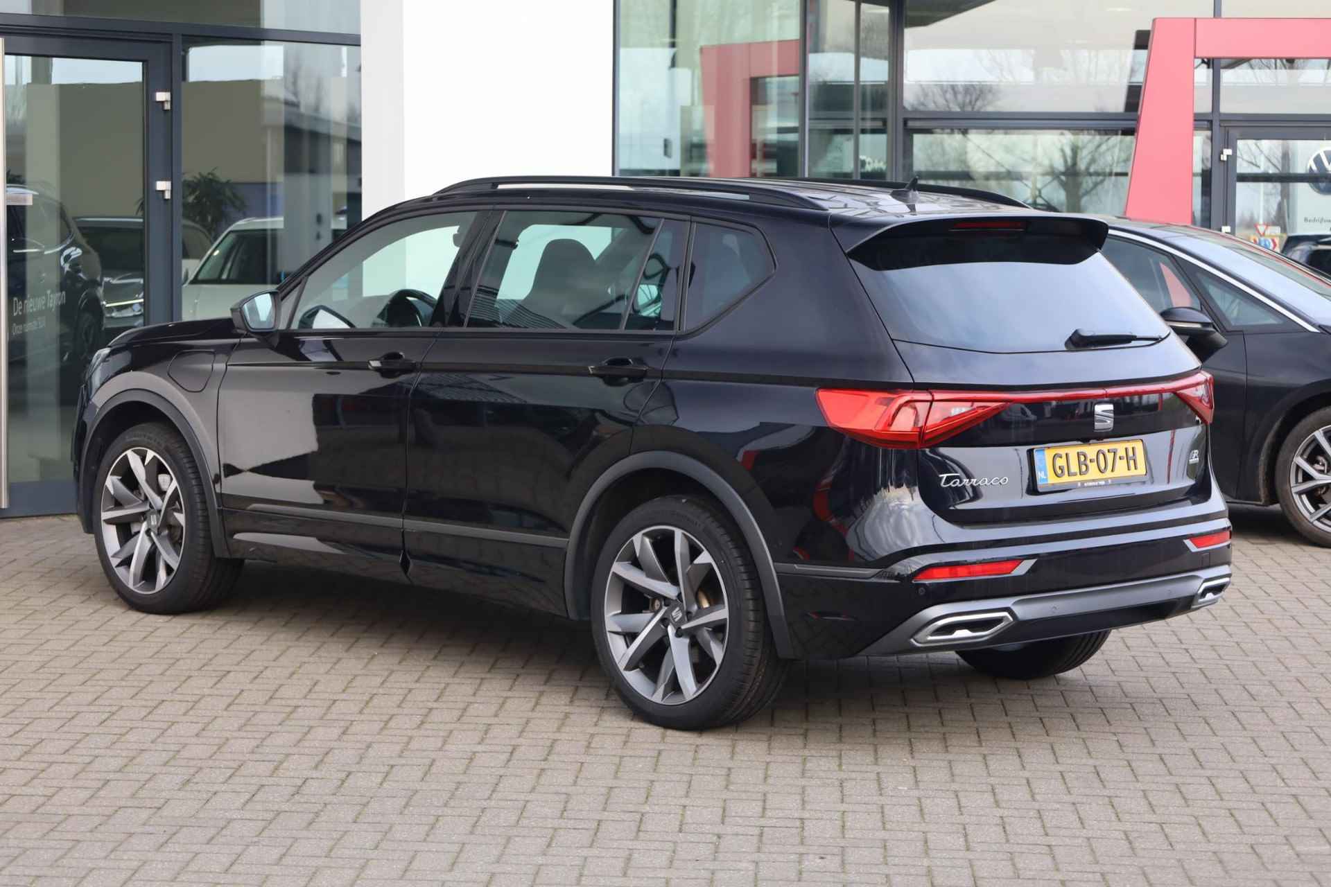 SEAT Tarraco 1.4 TSI e-Hybrid PHEV FR 245PK / 180kW DSG, Achteruitrijcamera, parkeersensoren voor en achter (pdc), verwarmbare voor- en achterstoelen, verwarmbaar stuurwiel, predictive adaptieve cruise control (acc) met Stop & Go + stuurhulp, full map navigatie, draadloos Apple Carplay / Android Auto, aanhanger manoeuvreer- en parkeerhulp, 20'' 'Supreme Cosmo Grey' LMV, keyless start & entry, DAB+, elektrisch verstelbare bestuurdersstoel met geheugen, elektrisch verstel-, verwarm en inklapbare spiegels, LED-verlichting - 7/51