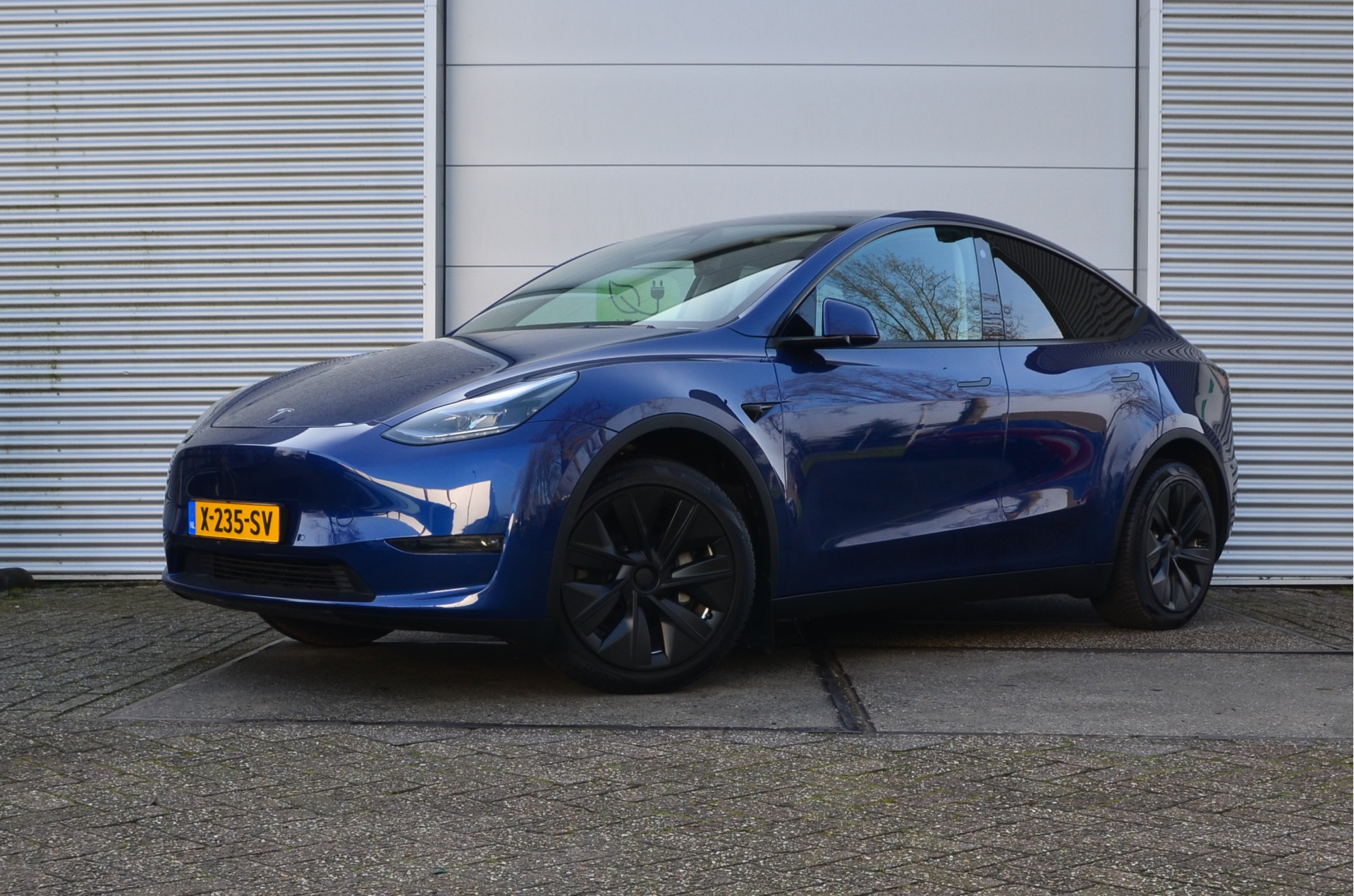 Tesla Model Y Long Range 75 kWh AutoPilot, Warmtepomp, PDC, Rijklaar prijs bij viaBOVAG.nl