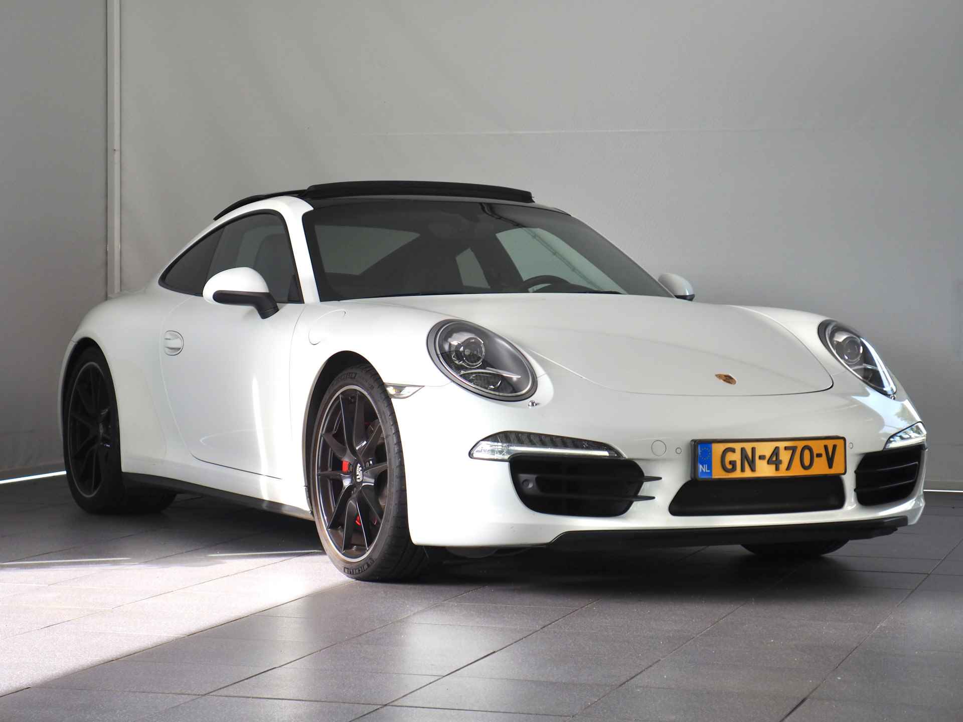 Porsche 911 3.8 Carrera 4S | Sport Chrono Pack | Panoramadak | Navigatie | Stoelverwarming | Achteruitrijcamera | Parkeersensoren voor- en achter | Sportuitlaat | - 17/35