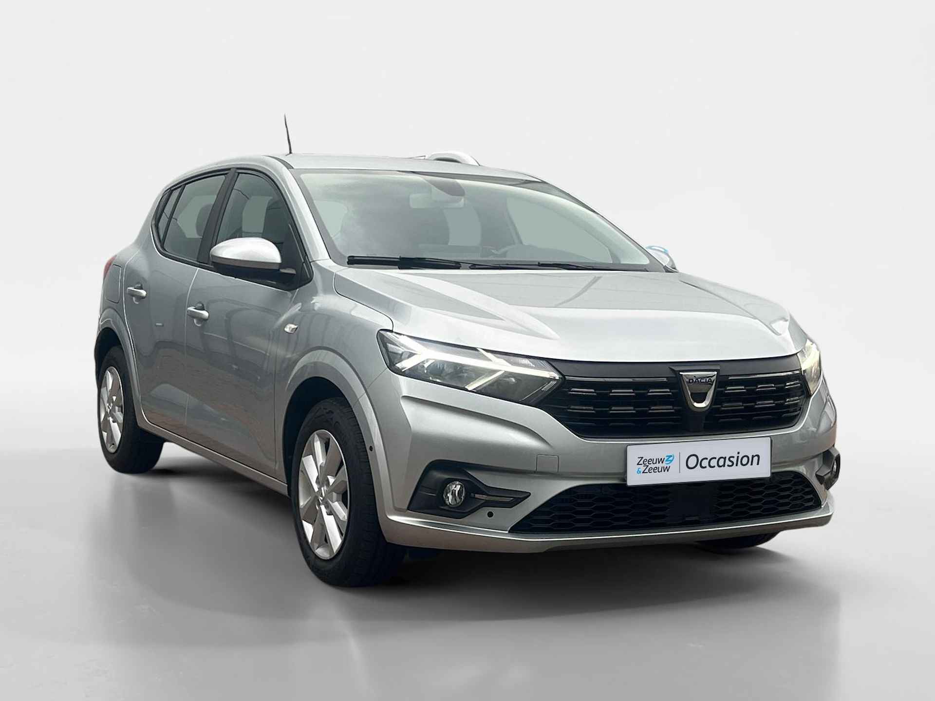 Dacia Sandero 1.0 - 90PK TCe Comfort | 1e eigenaar | Camera | Parkeersensoren | Airco | Armsteun | Full LED | Apple CarPlay/Android Auto | Cruise Control | - 7/25