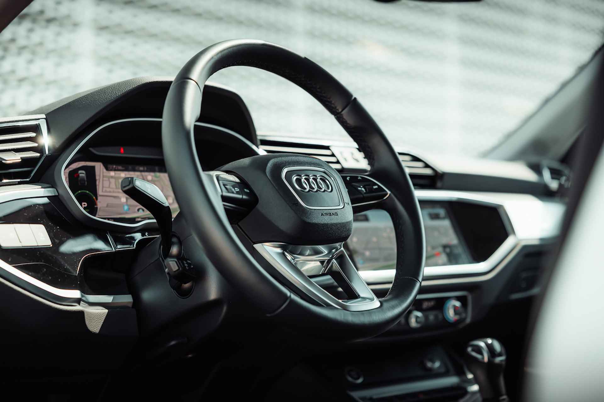 Audi Q3 Sportback 45 TFSIe 245pk s-tronic S Line exterieur | Leder | Elektr. voorstoelen | Camera | MMI navigatie plus | Comfortsleutel | Adaptive cruise control | Audi Sound - 21/34