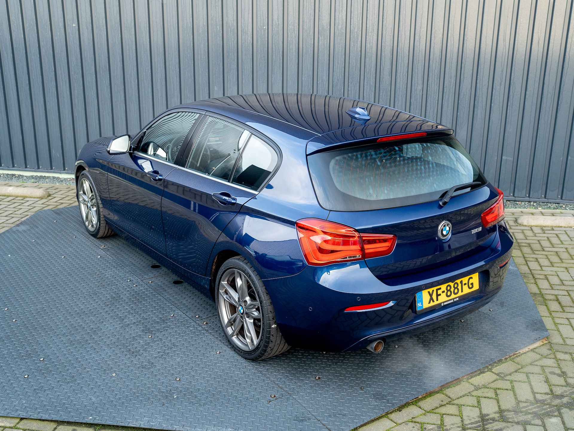 BMW 1-serie 118i High Executive | Leder | Camera | Parkeersensoren V&A | Stoelverwarming | Prijs Rijklaar!! - 34/41