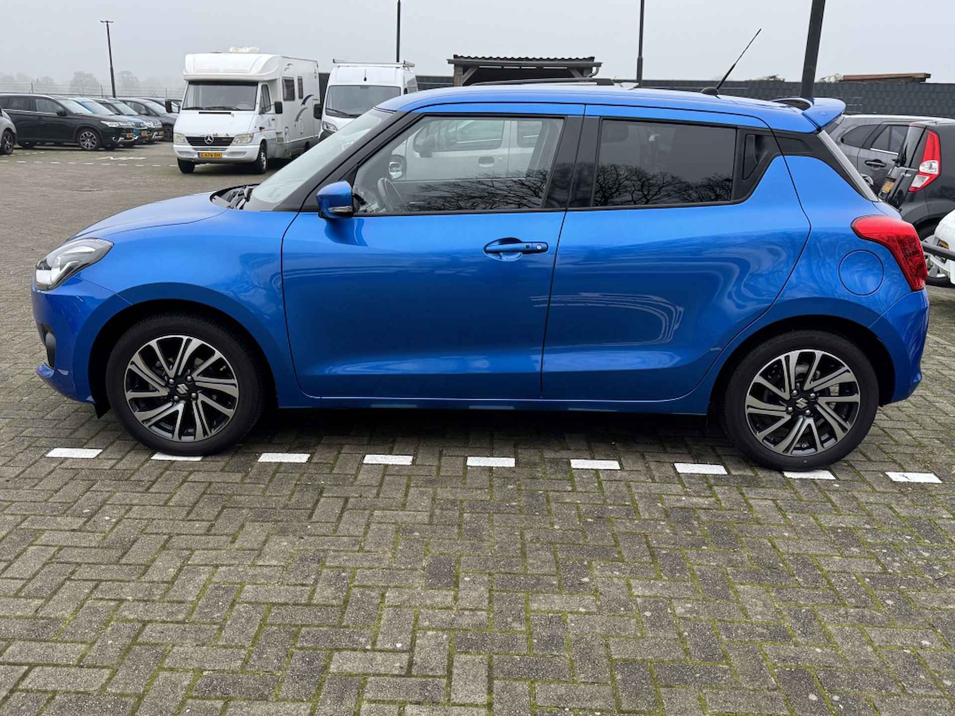 Suzuki Swift 1.2 Style Smart Hybrid /CRUISE/NAVIGATIE/ORG NL - 2/10