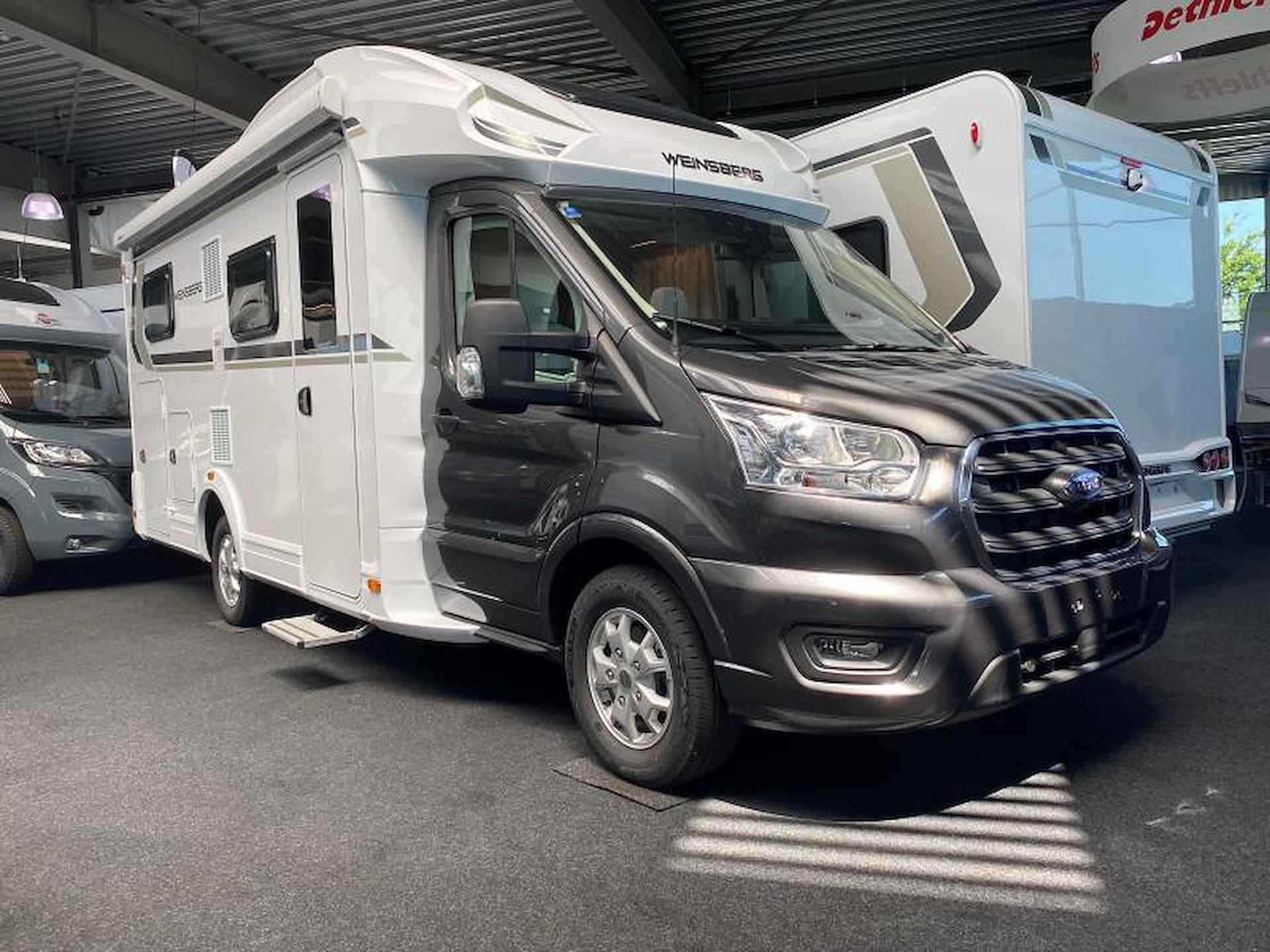 Weinsberg CaraSuite 650 MEG Family Camper met hefbed - 5/16