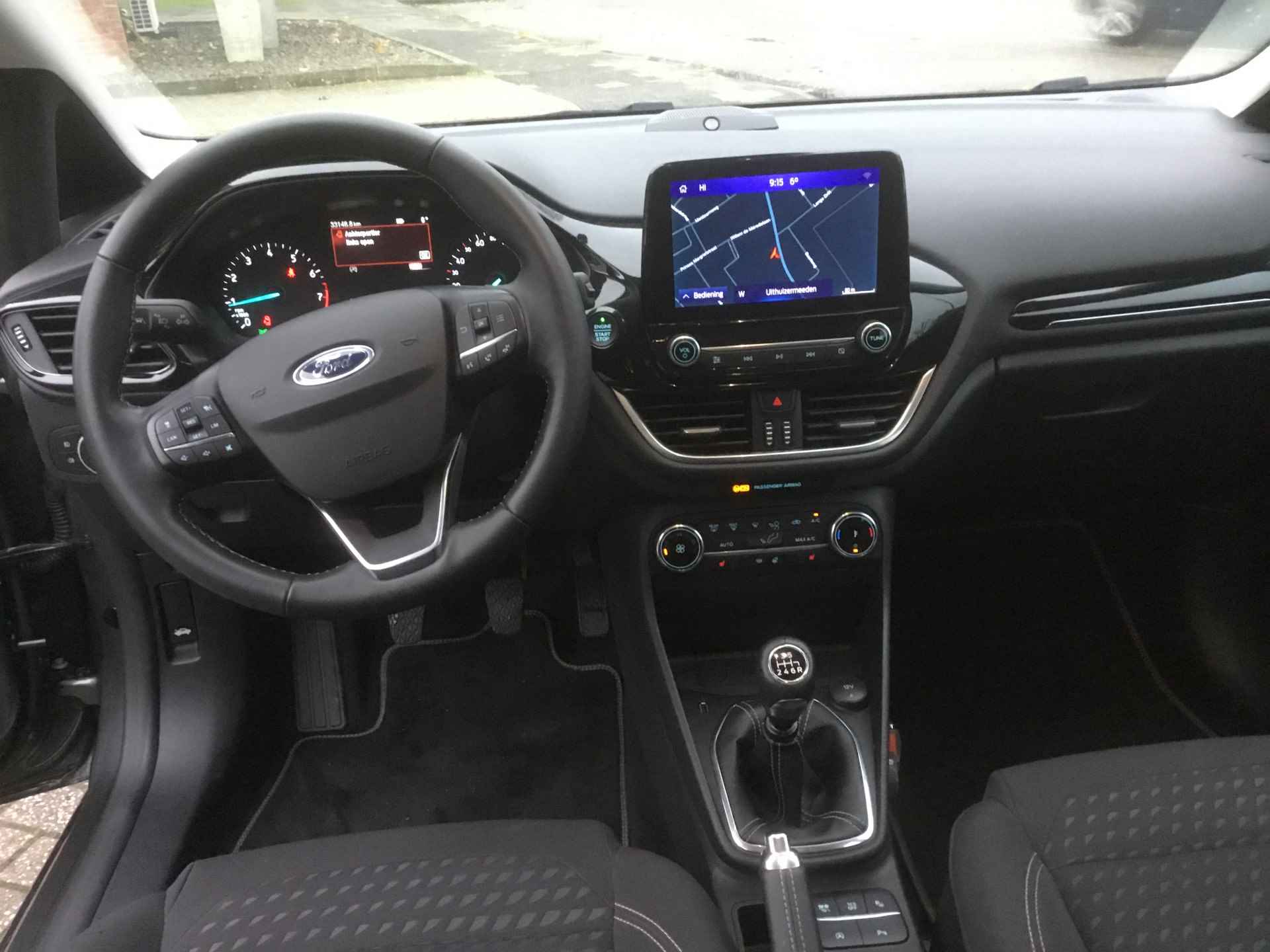 Ford Fiesta 1.0 EcoBoost Titanium X - 32/34