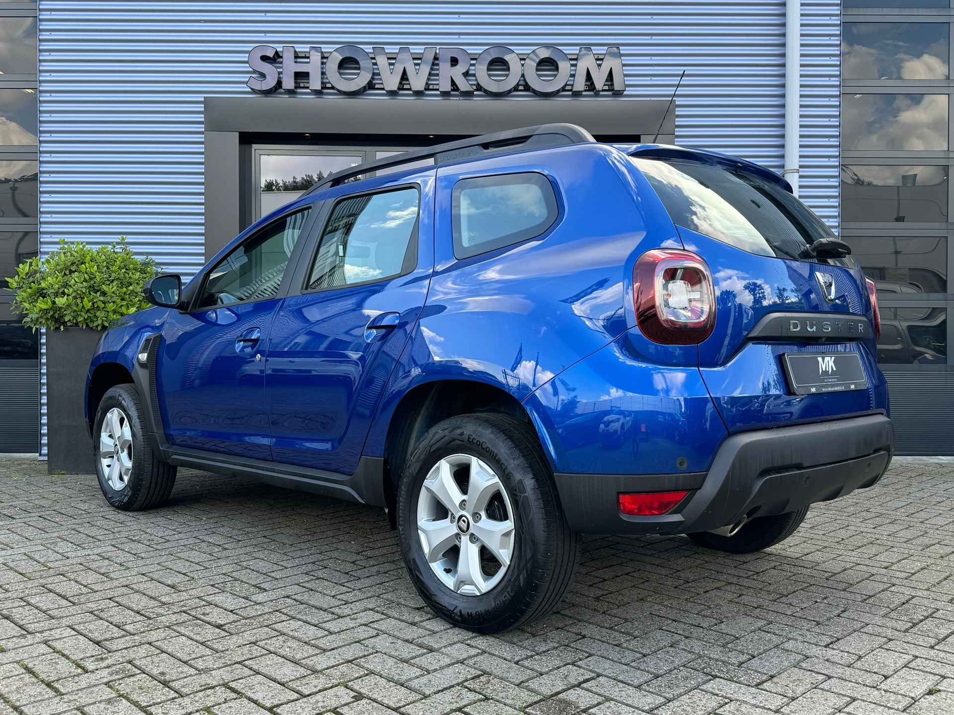 Dacia DUSTER 1.0 TCe 100 Bi-Fuel Essential Cruisecontrol|Apple|Camera|Navi - 4/33