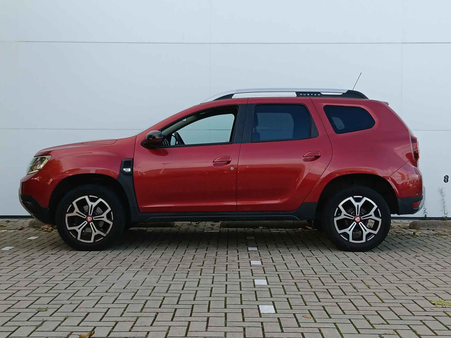 Dacia Duster 1.3 TCe 130 Tech Road Trekhaak / Parkeersensoren + Camera / Navigatie / Climate Control / Cruise Control - 37/39