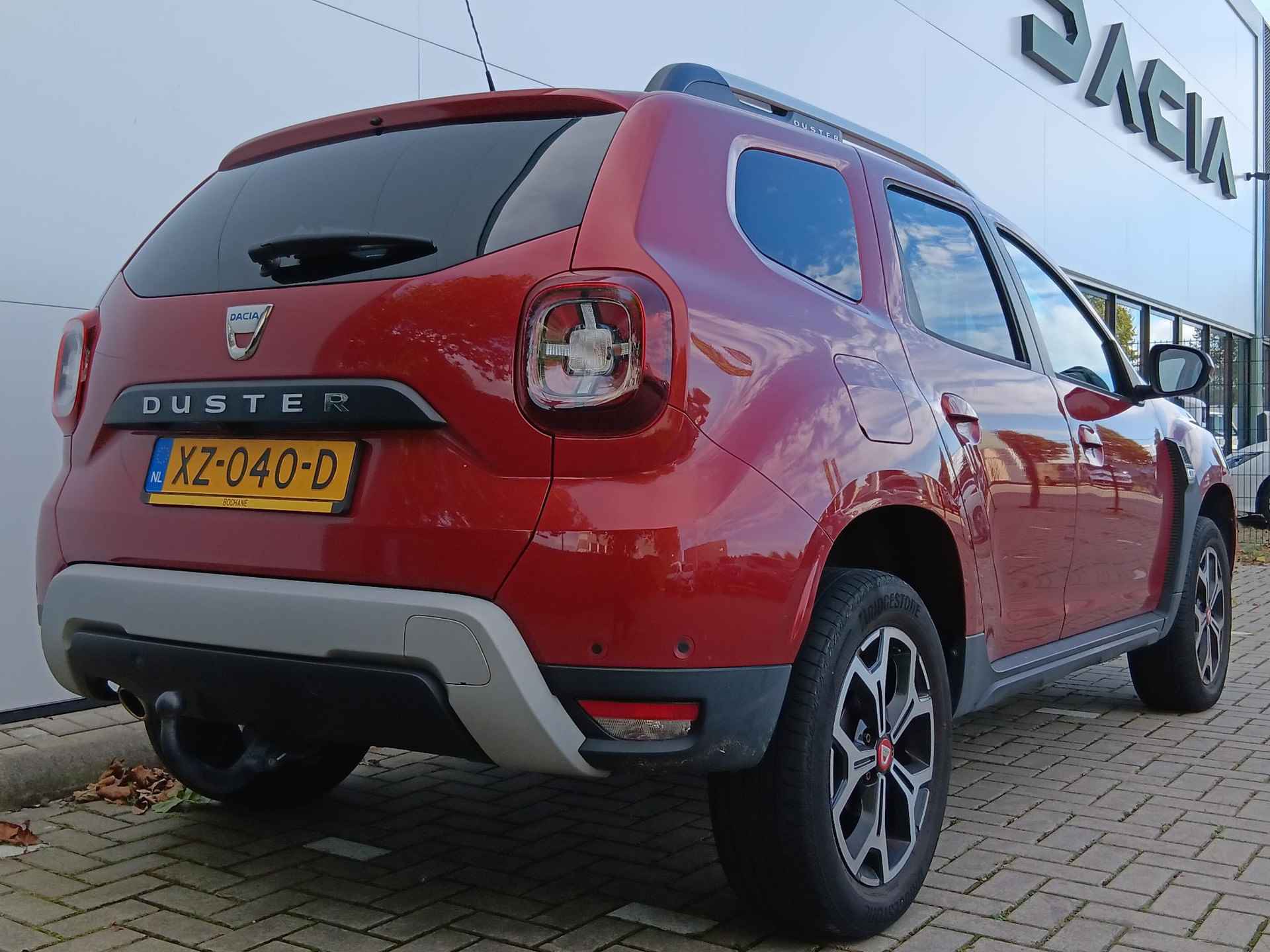 Dacia Duster 1.3 TCe 130 Tech Road Trekhaak / Parkeersensoren + Camera / Navigatie / Climate Control / Cruise Control - 35/39