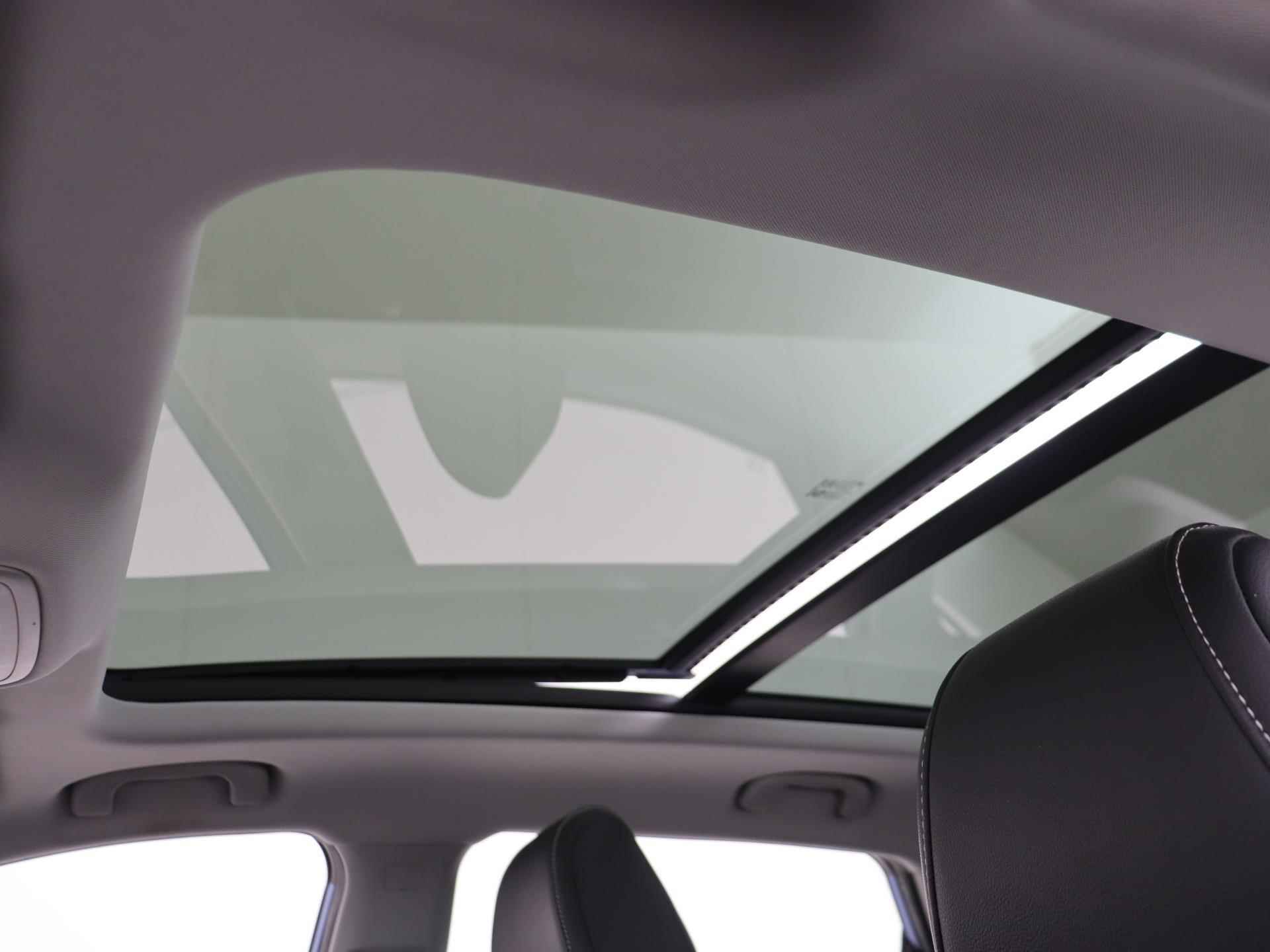 MG ZS EV Luxury | Leder | Panoramadak | Navi | Camera | Apple CarPlay | - 28/31