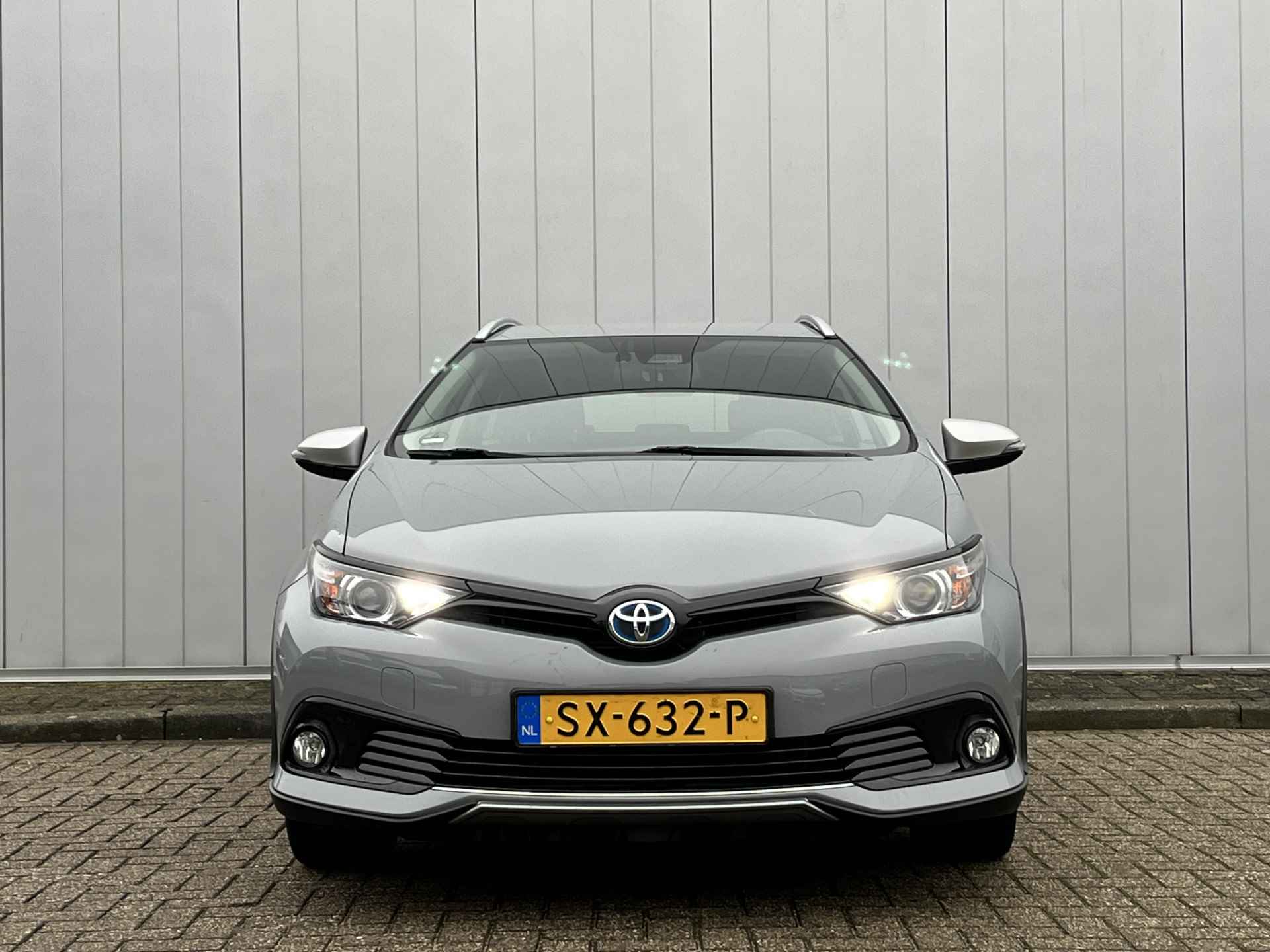 Toyota Auris Touring Sports 1.8 Hybrid Freestyle NL Auto Dealer Onderhouden Navi Clima Cruise - 4/25