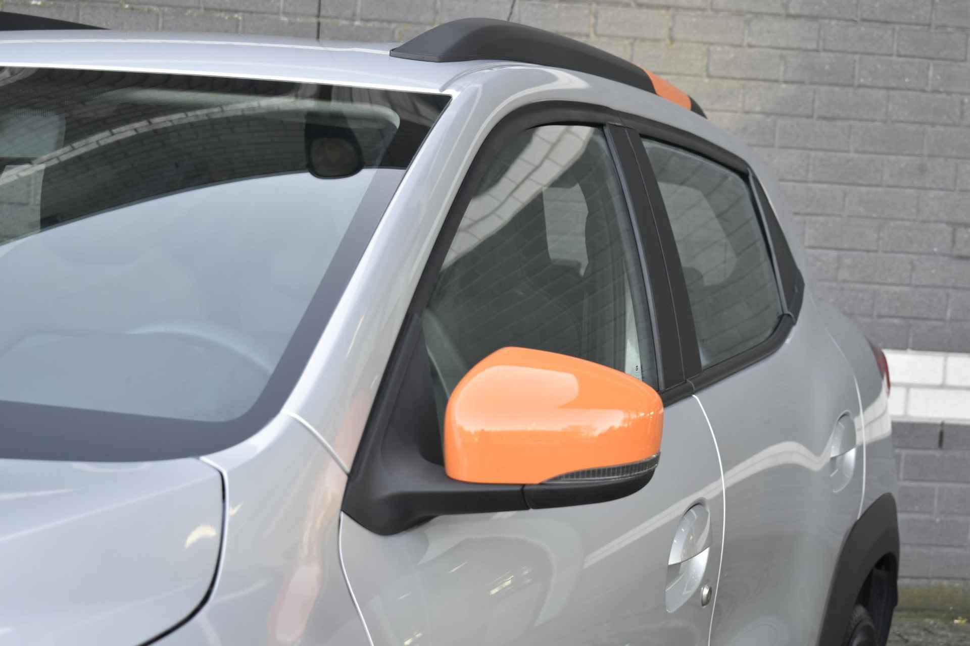 Dacia Spring Comfort Plus (Orange Pack) 27 kWh / Navigatie / Camera - 21/37