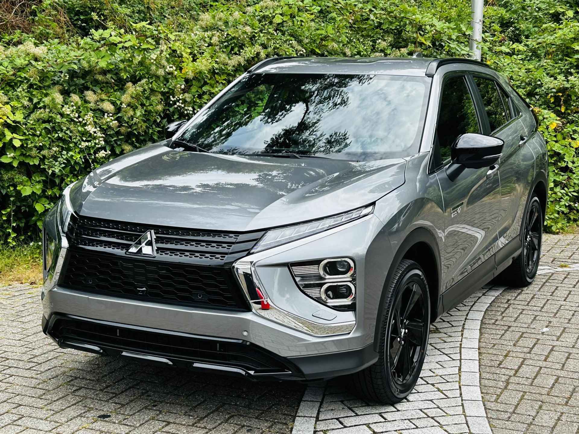 Mitsubishi Eclipse Cross 2.4 PHEV Black Edition | € 8000 ,- VOORRAAD KORTING | AUTOMAAT | BLINDSPOT | NOODREMSYSTEEM | 4X4 | 360 GRADEN CAMERA | STOEL & STUURVERWARING | - 30/34