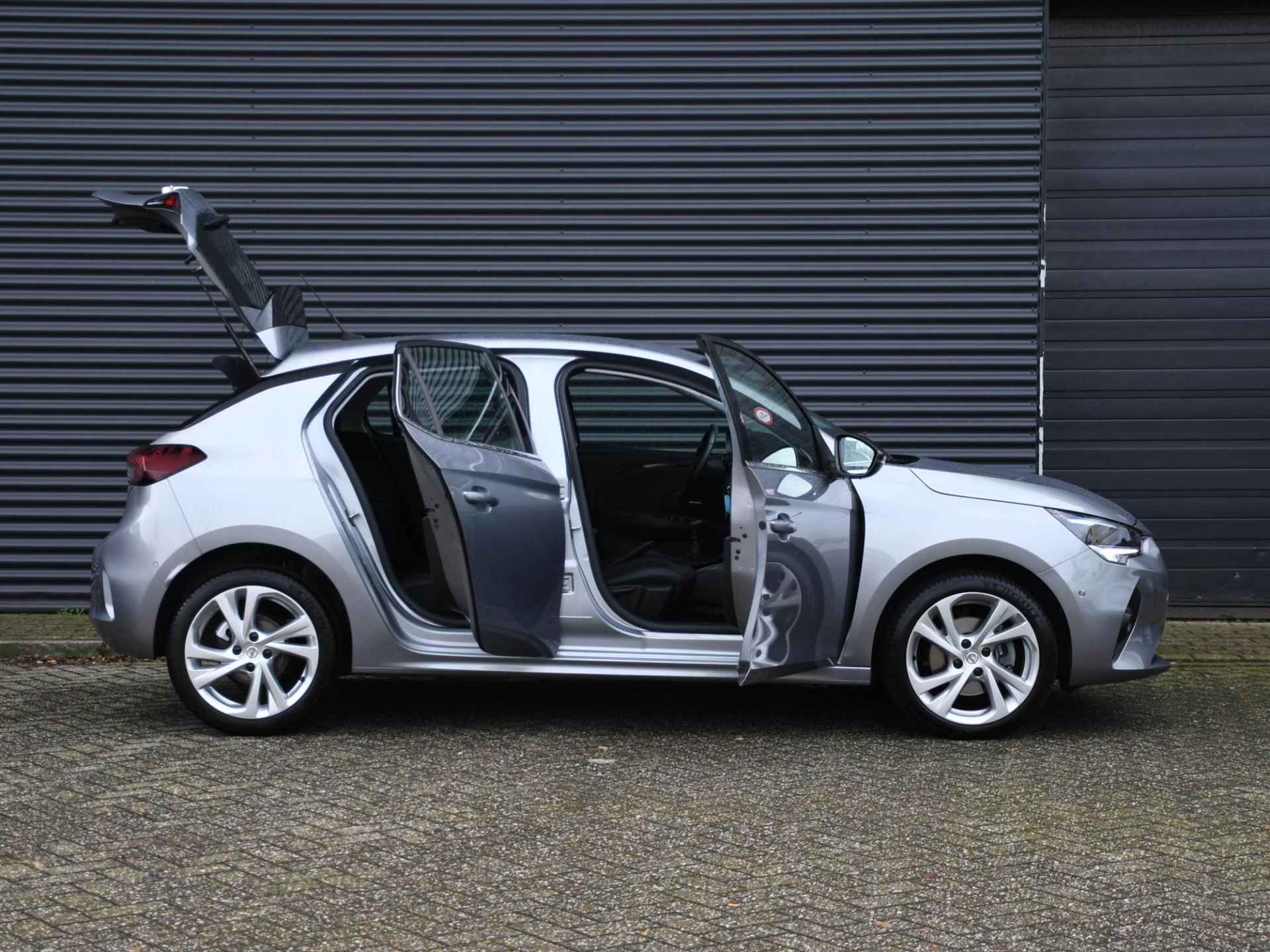 Opel Corsa Elegance 1.2 Turbo 102pk PDC + CAM. | 17''LM | CRUISE.C | DODE HOEK | DAB | AIRCO - 26/27