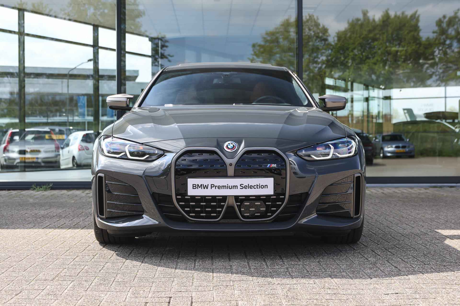 BMW i4 M50 High Executive 84 kWh / BMW M 50 Jahre uitvoering / Schuif-kanteldak / Adaptief M Onderstel / Laserlight / M Sportstoelen / Driving Assistant Professional / Comfort Access - 7/40