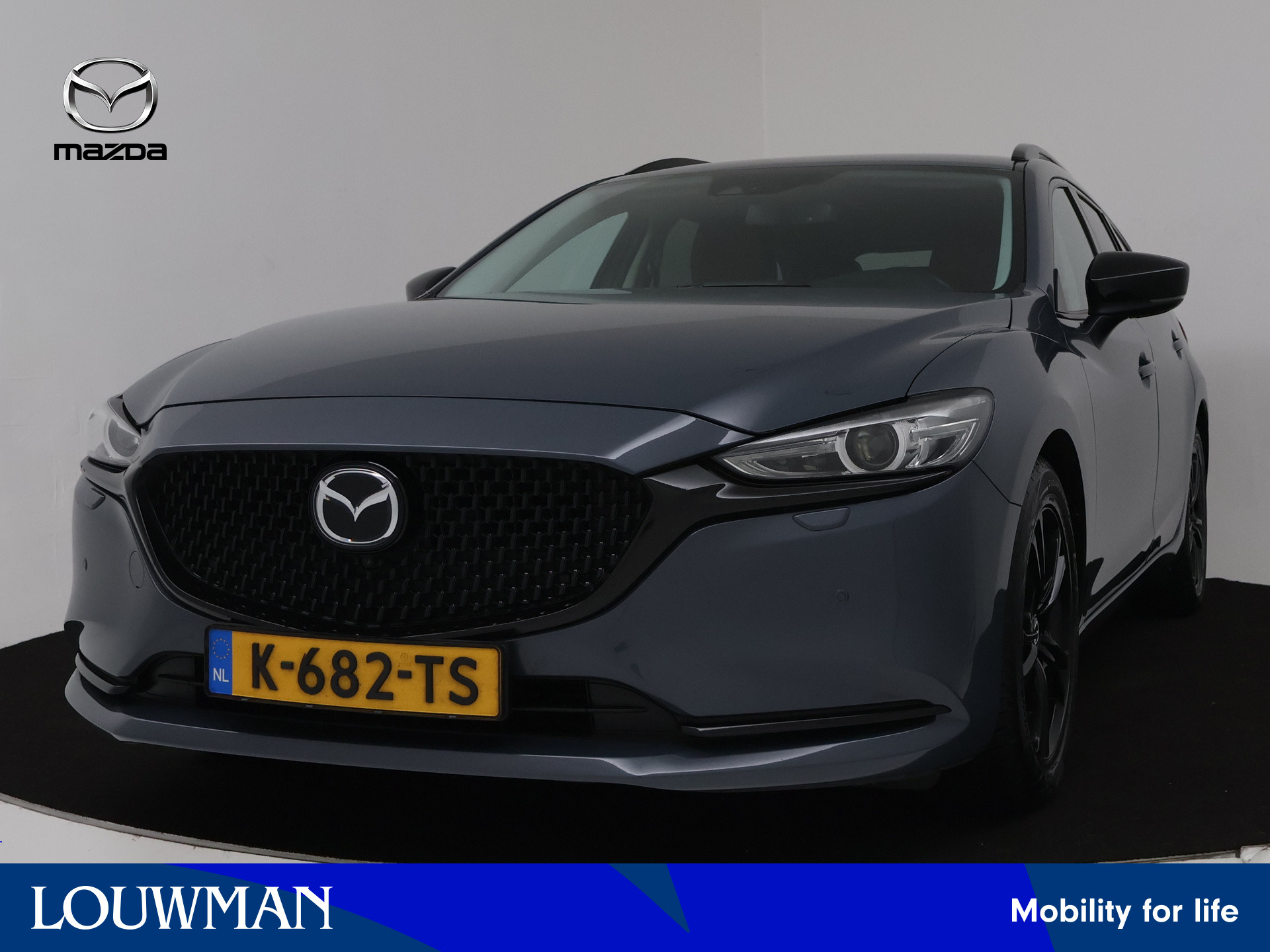 Mazda 6 Sportbreak 2.0 SkyActiv-G 165 Sportive automaat | BOSE Audio | 360 Camera | Afneembare trekhaak | Head-up Display | Navigatie | Stoelverwarming/-Verkoeling | Achterbank Verwarming | Stuurverwarming | Rood Leder |