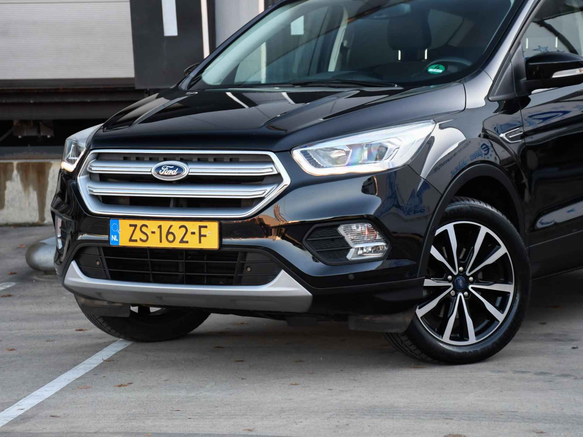 Ford Kuga Titanium 1.5 EcoBoost 120pk PDC + CAM. | NAVI | APPLE-CARPLAY | 19''LM | SFEERVERL. | CRUISE.C - 2/33