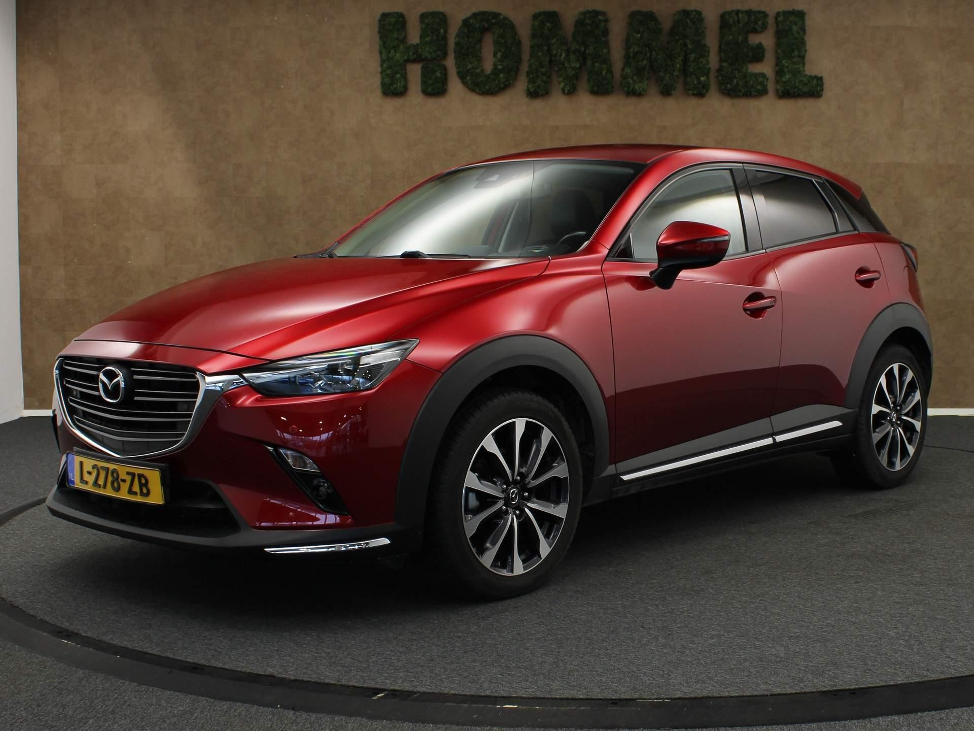 Mazda CX-3 2.0 SkyActiv-G 120 GT-M -NAVIGATIE - VASTE TREKHAAK- TREKGEWICHT 1200 KG- CLIMATE CONTROL - HEAD UP DISPLAY - VOORSTOELEN VERWARMD - PARKEERSENSOREN VOOR/ ACHTER - BLUETOOTH - 18 INCH LICHT METALEN VELGEN