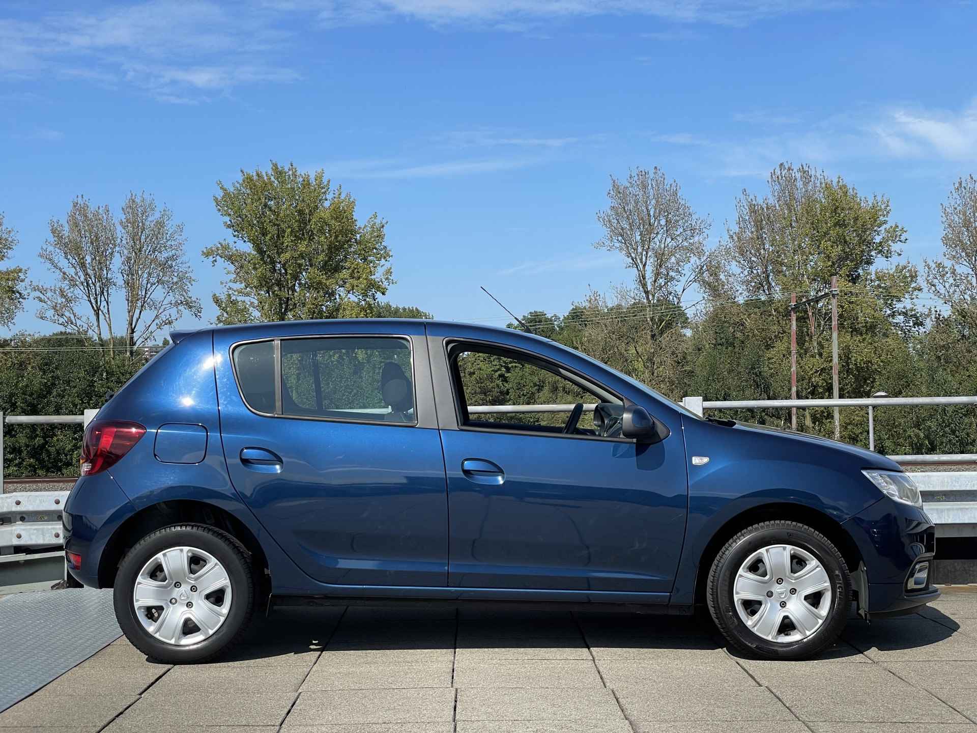 Dacia Sandero 0.9 TCe Laureate | Navigatie | Airco | Cruise Control Rijklaarprijs! | - 33/34