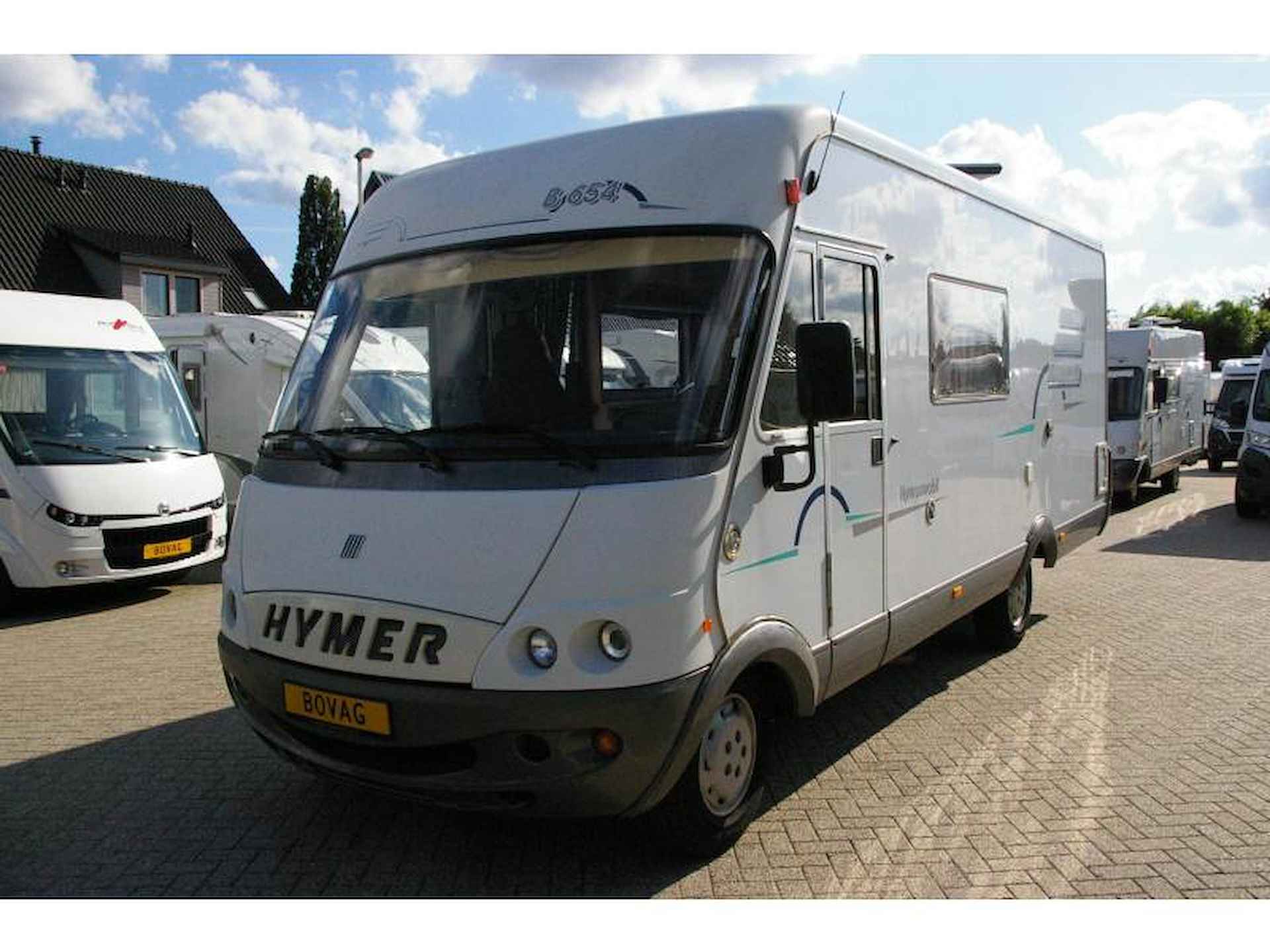 Hymer B654  Treinzit, fransbed,hefbed - 4/14