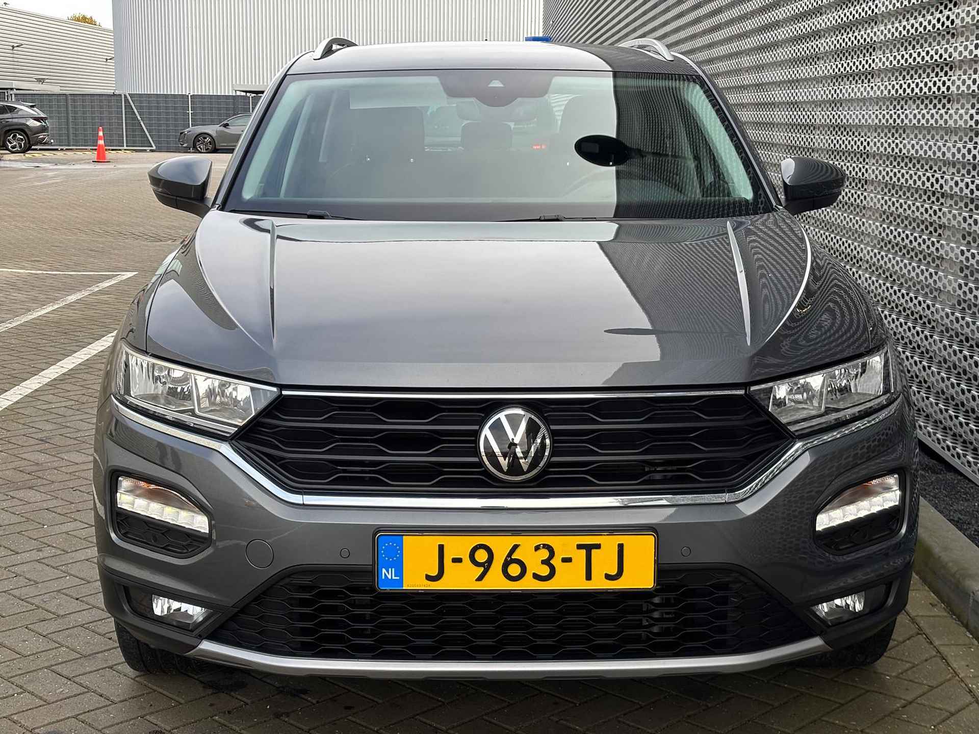 Volkswagen T-Roc 1.0 TSI Style / 17" LMV / Parkeersensoren V+A / Navigatiesysteem - 11/27