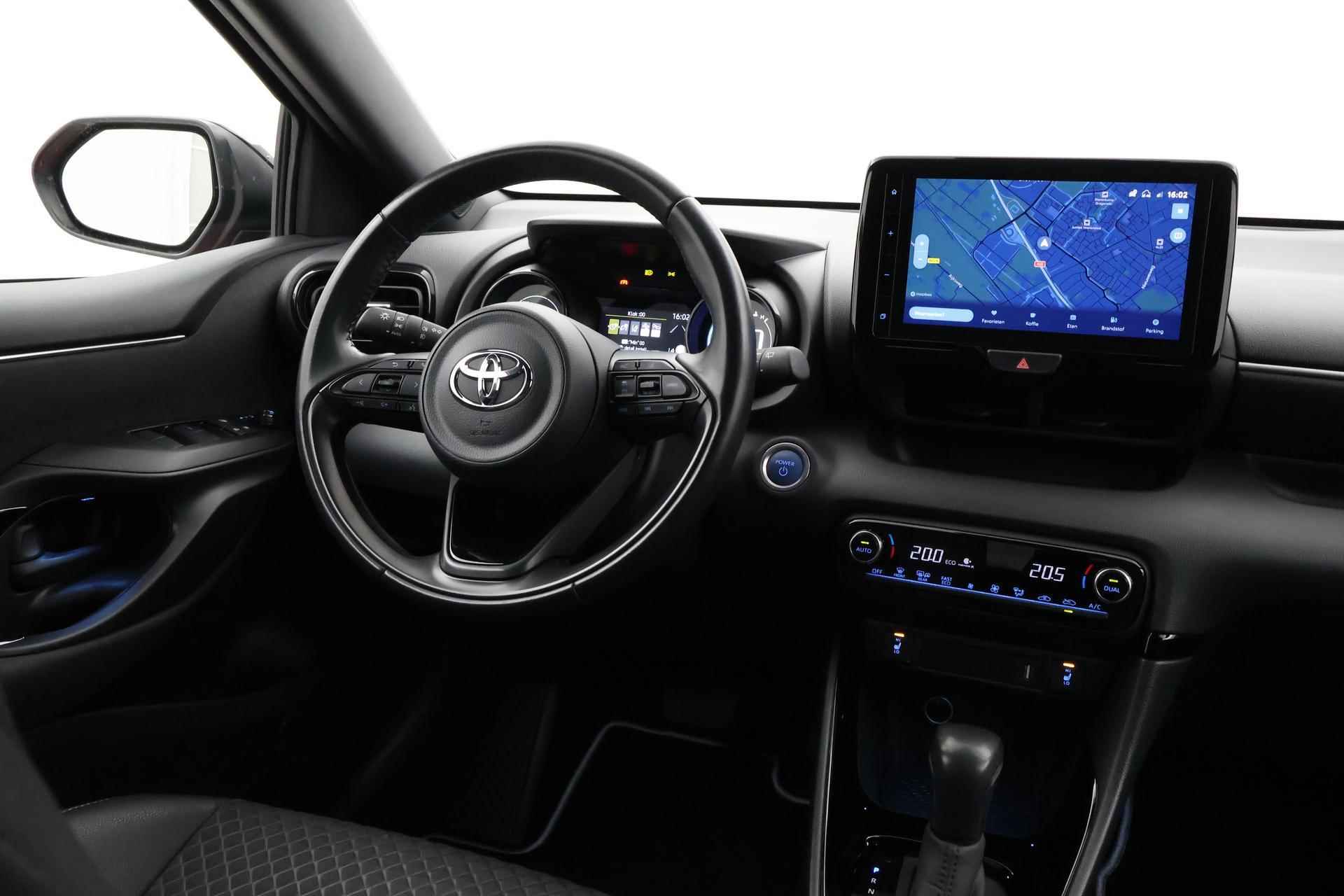 Toyota Yaris 1.5 Hybrid Dynamic Bi-tone | Winterpack | Navigatie | 17 inch | Apple Carplay / Android Auto - 22/35