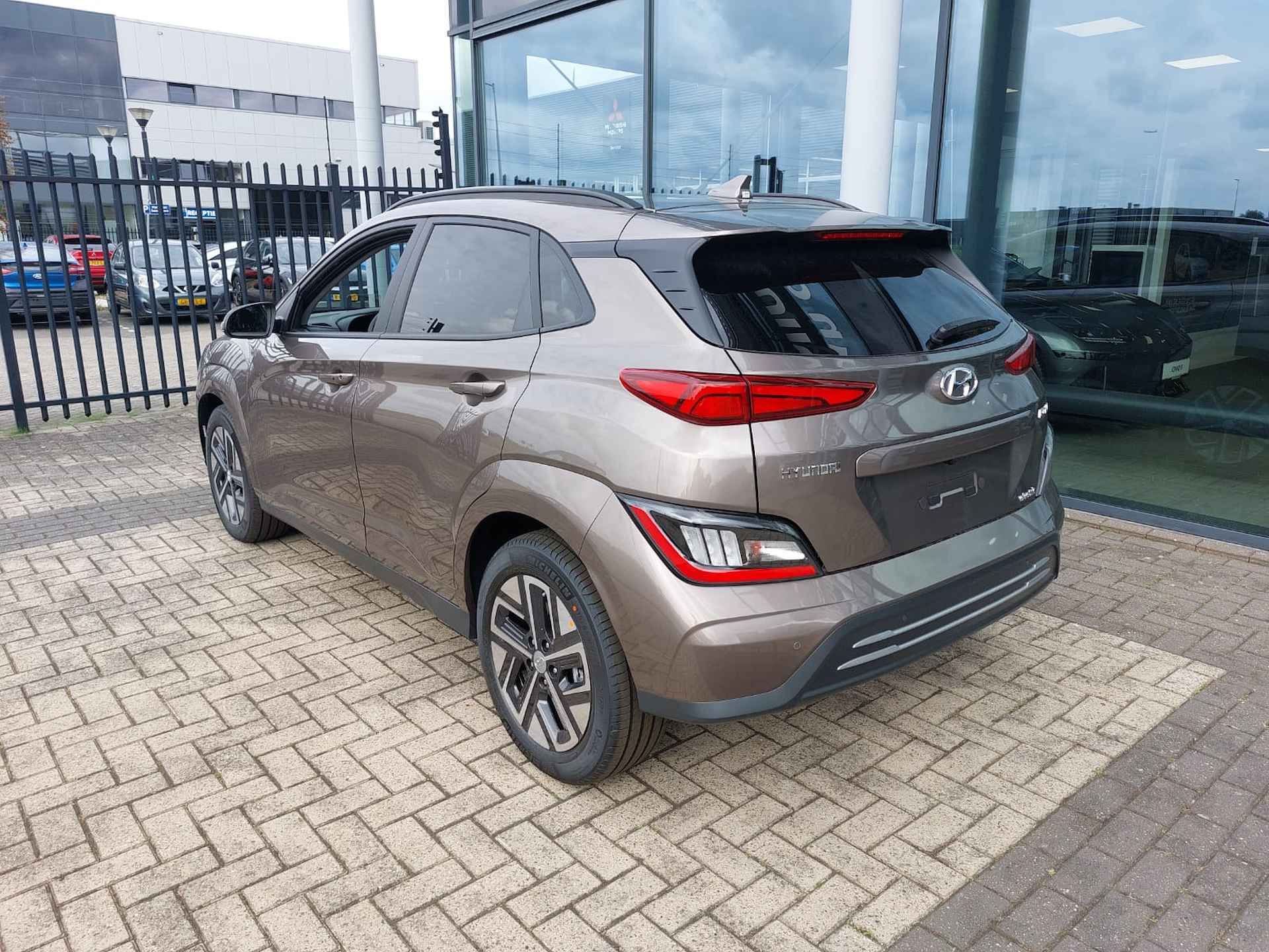 Hyundai KONA EV Fashion 64 kWh | VAN €46.130 VOOR €38.607,- Silky Bronze - 16/20