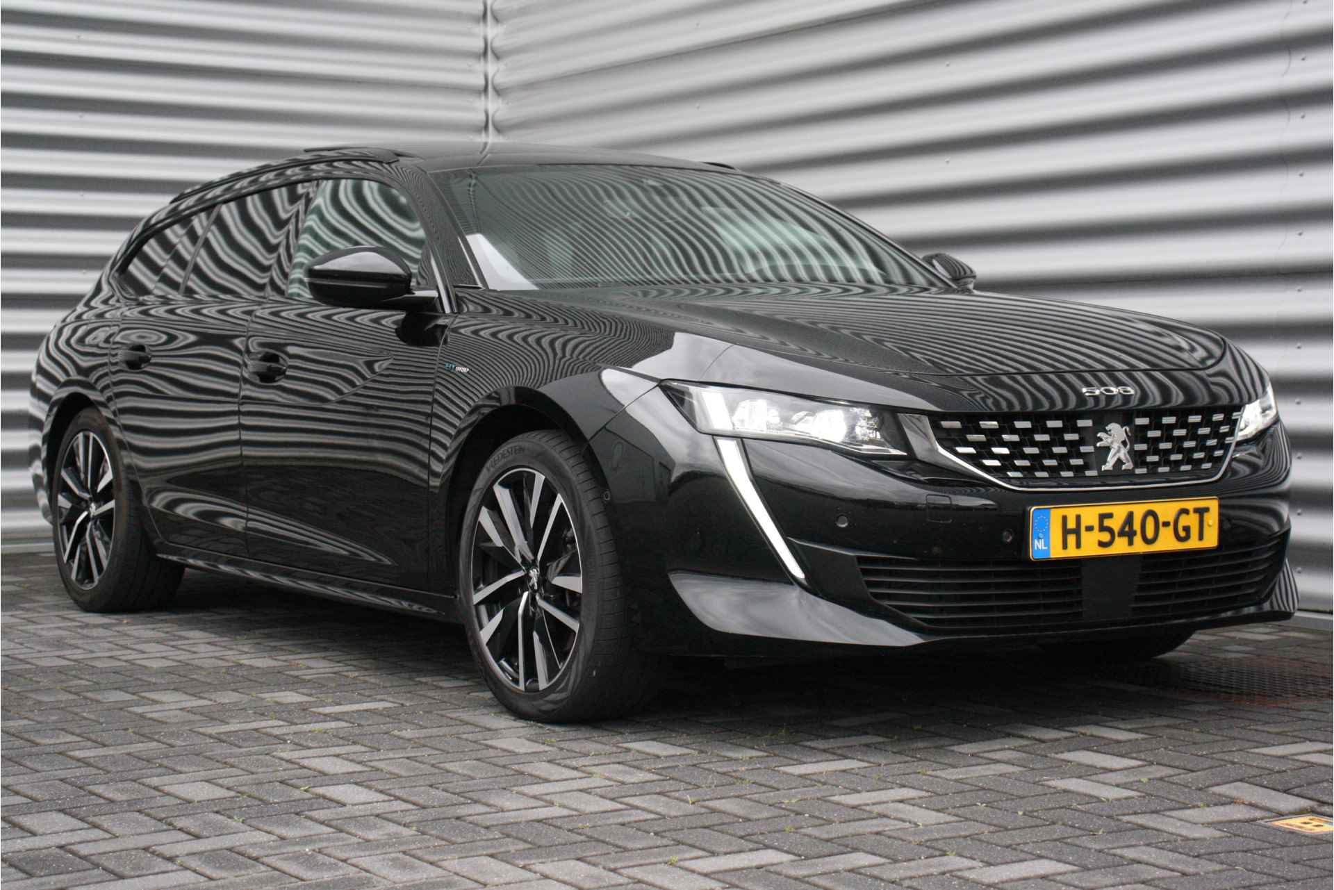 Peugeot 508 SW 1.6 HYBRID 225PK GT PREMIÈRE AUTOMAAT / NAVI / LEDER / CLIMA / PDC / AGR / 18" LMV / CAMERA / KEYLESS / FOCAL / ALCANTARA / F - 4/45