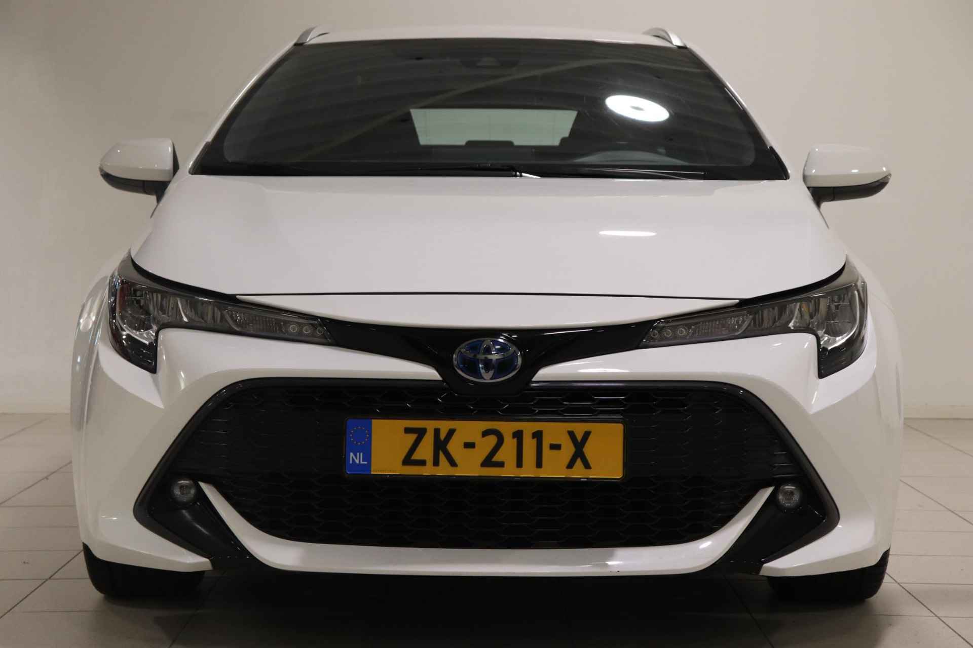 Toyota Corolla Touring Sports 1.8 Hybrid First Edition, Trekhaak, Climate Control, Cruise Control, Apple Carplay & Android Auto, Camera, Navigatie! - 6/39