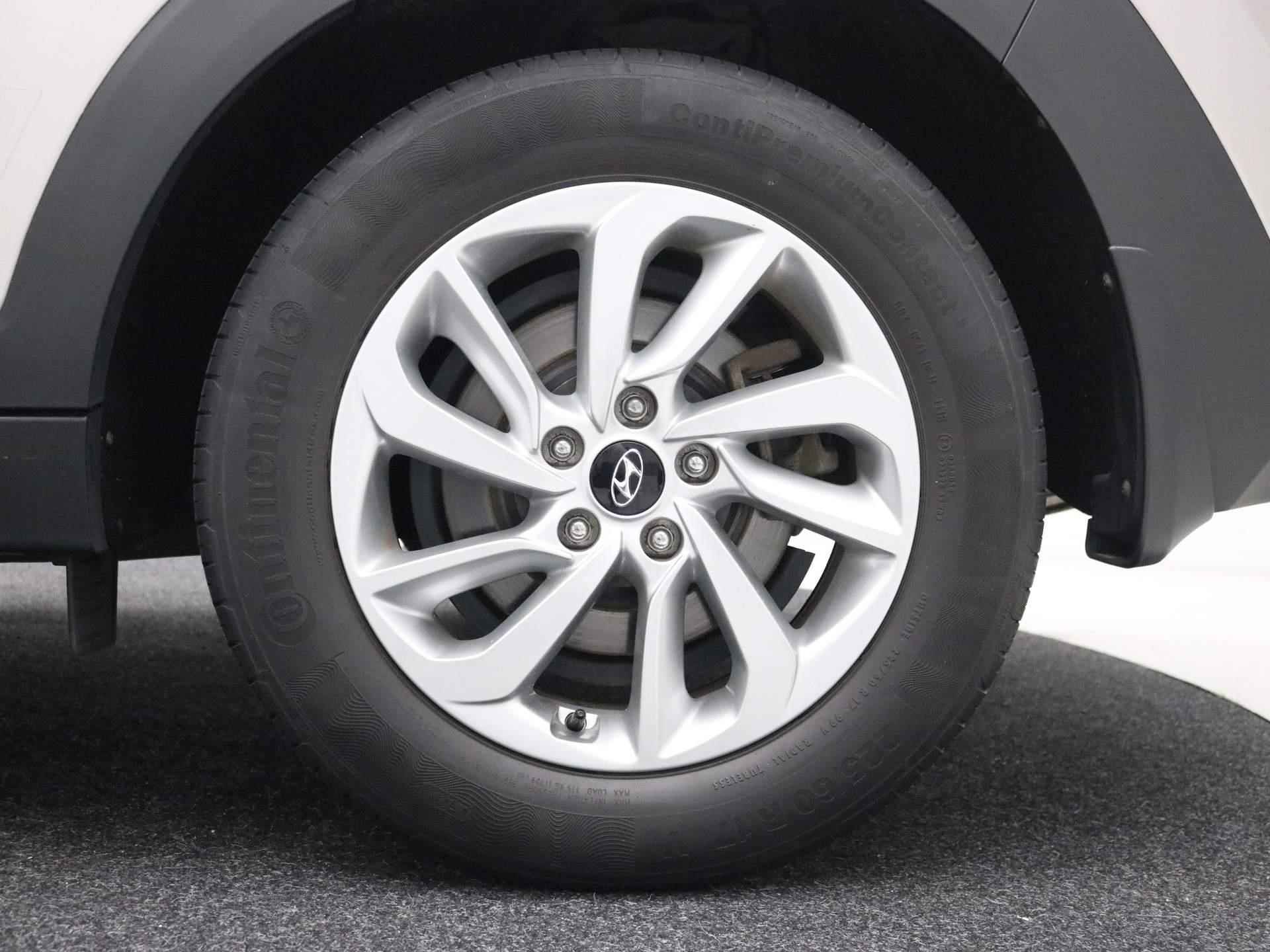 Hyundai Tucson 1.6 T-GDi 177PK Comfort AUTOMAAT / Trekhaak / 1600KG Trekgewicht / Lederen bekleding / Navigatie / Parkeersensoren voor & achter / Stoelverwarming voor & achter / Cruise Control / - 13/64