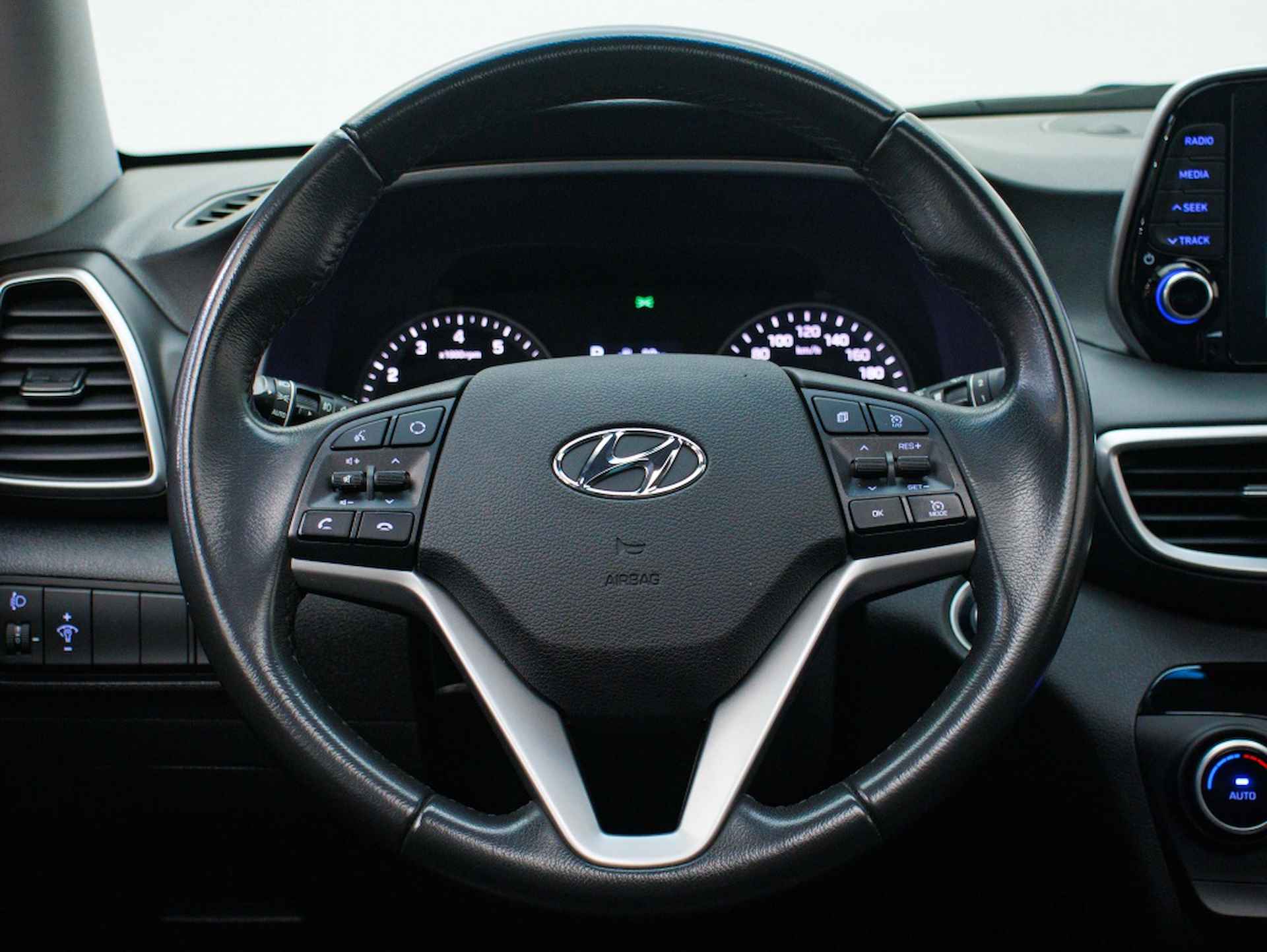 Hyundai Tucson 1.6 T-GDI Comfort | Automaat | Leder | Panoramadak - 25/43