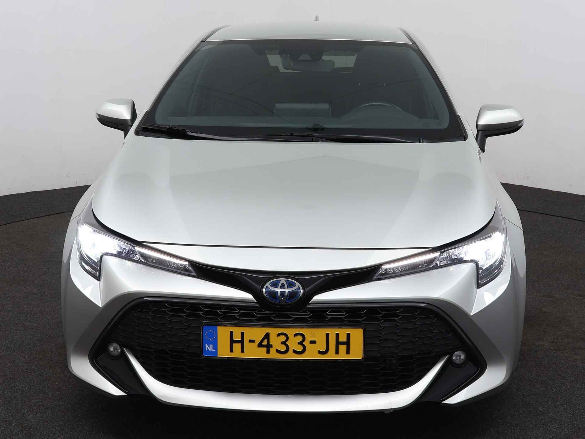 Toyota Corolla 1.8 Hybrid Dynamic | Trekhaak | LM velgen | Stoelverwarming | Climate Control | - 25/38