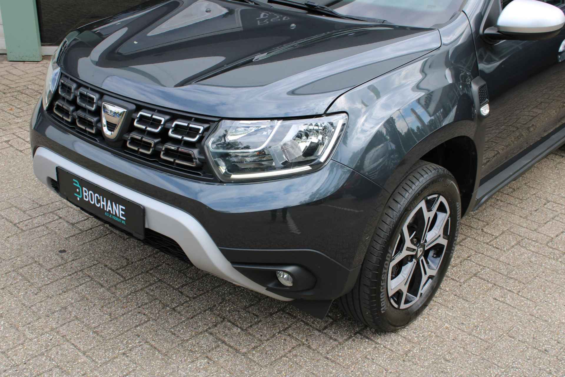 Dacia Duster 1.3 TCe 130 Prestige | Trekhaak afneembaar | Navigatie systeem | Achteruitrij camera - 31/39