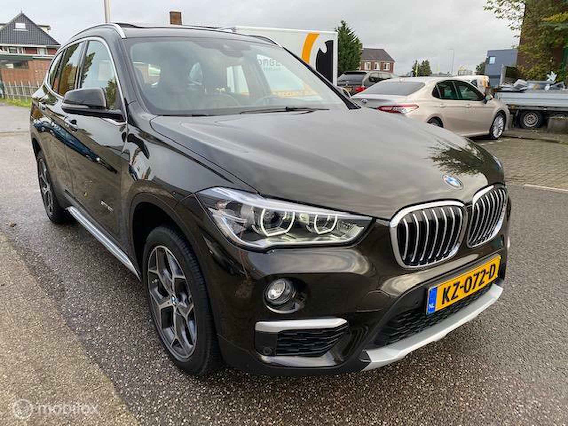 BMW X1 sDrive20i 192pk Centennial High Executive , Panorama dak , Navigatie , Parkeerhulp , Leder bekleding stoel verwarming , Trekgewicht 1800 kg, full option , lage km stand incl NAP  , 1e eigenaar - 7/39