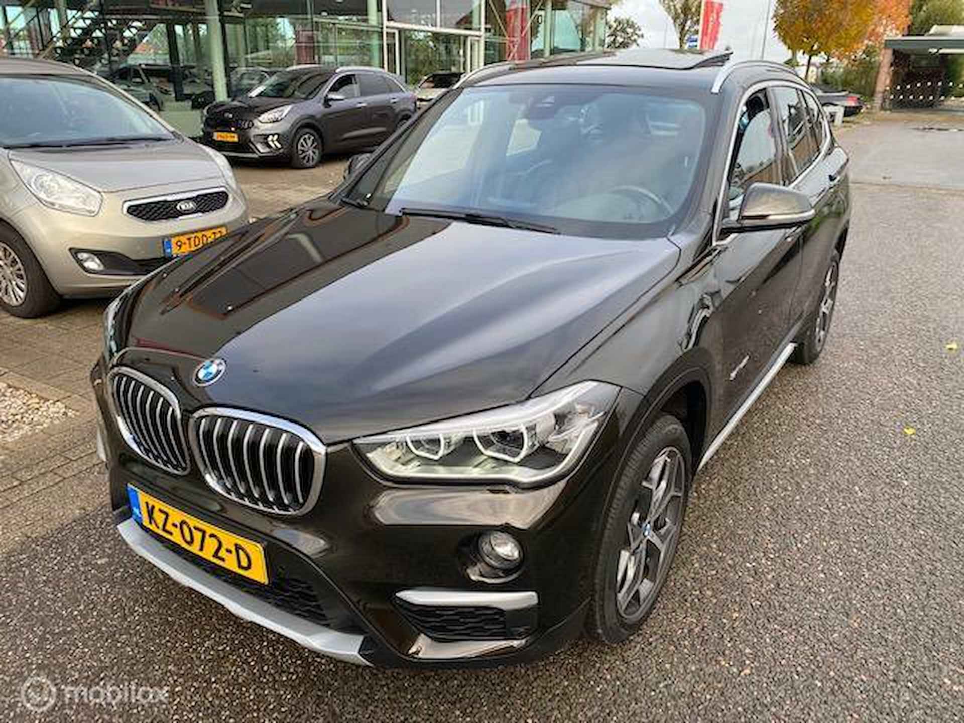 BMW X1 sDrive20i 192pk Centennial High Executive , Panorama dak , Navigatie , Parkeerhulp , Leder bekleding stoel verwarming , Trekgewicht 1800 kg, full option , lage km stand incl NAP  , 1e eigenaar - 10/39