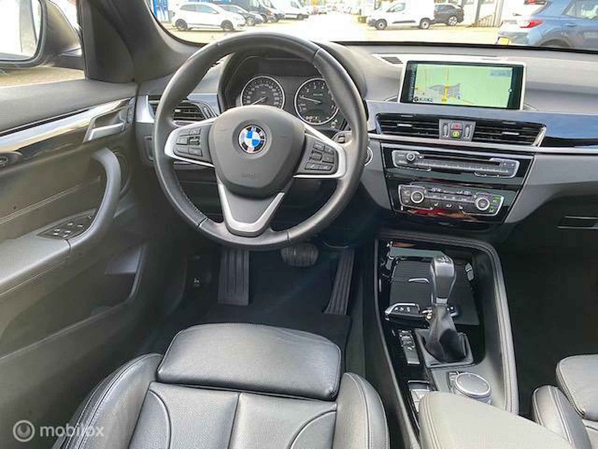 BMW X1 sDrive20i 192pk Centennial High Executive , Panorama dak , Navigatie , Parkeerhulp , Leder bekleding stoel verwarming , Trekgewicht 1800 kg, full option , lage km stand incl NAP  , 1e eigenaar - 19/39