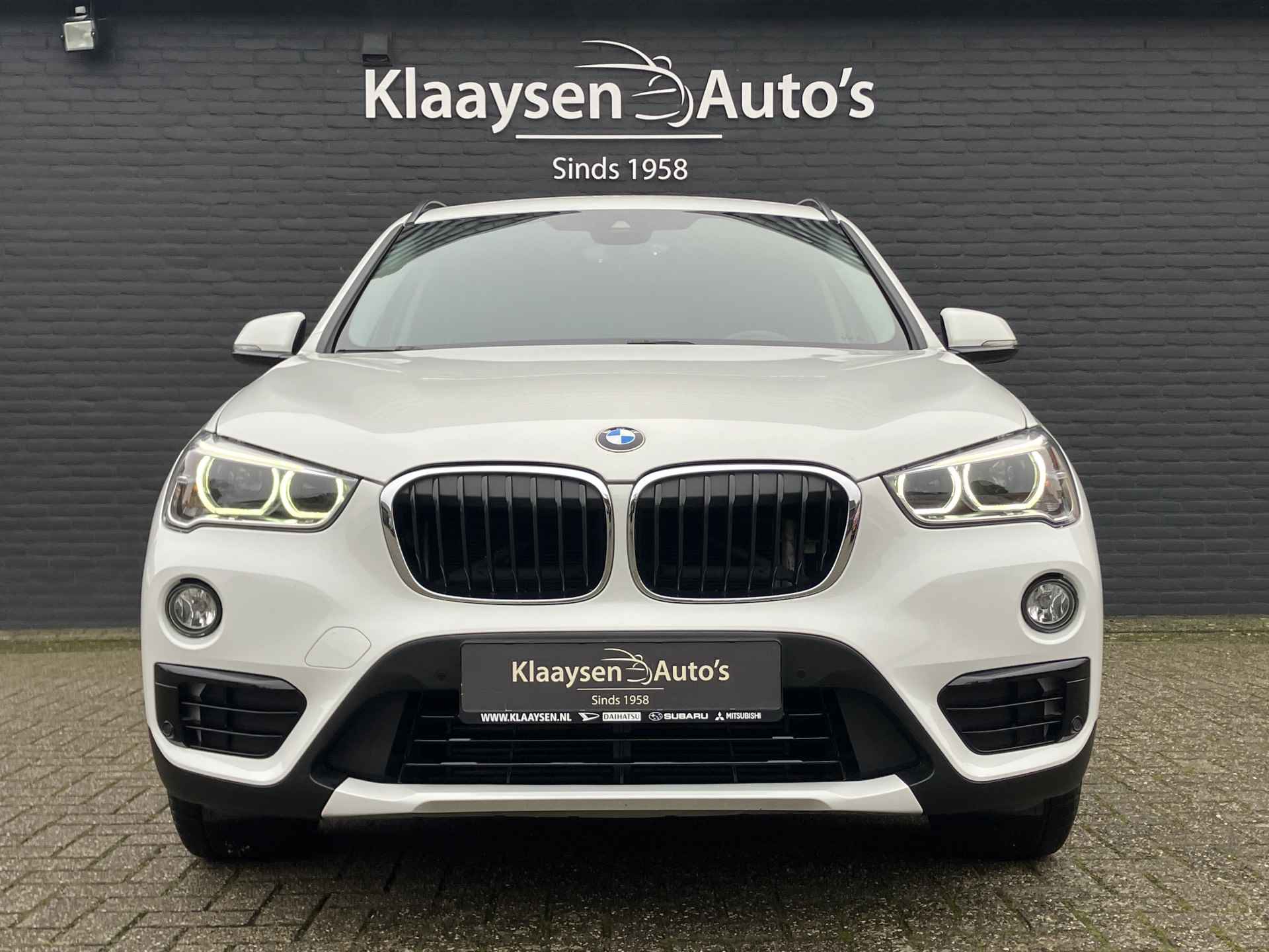 BMW X1 xDrive20i 192 pk High Executive AUT. | dealer onderhouden | cruise control | navigatie | bruin leder interieur | sportstoelen - 3/38