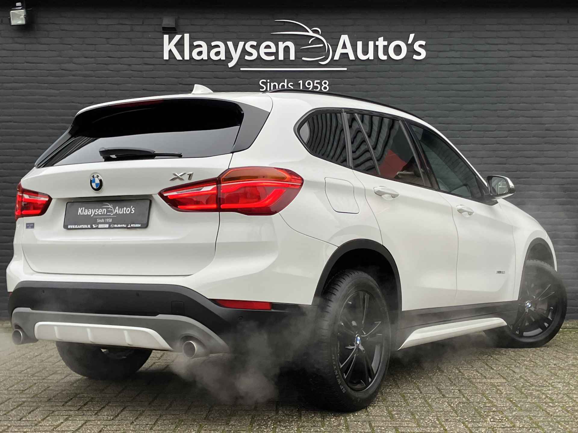 BMW X1 xDrive20i 192 pk High Executive AUT. | dealer onderhouden | cruise control | navigatie | bruin leder interieur | sportstoelen - 6/38